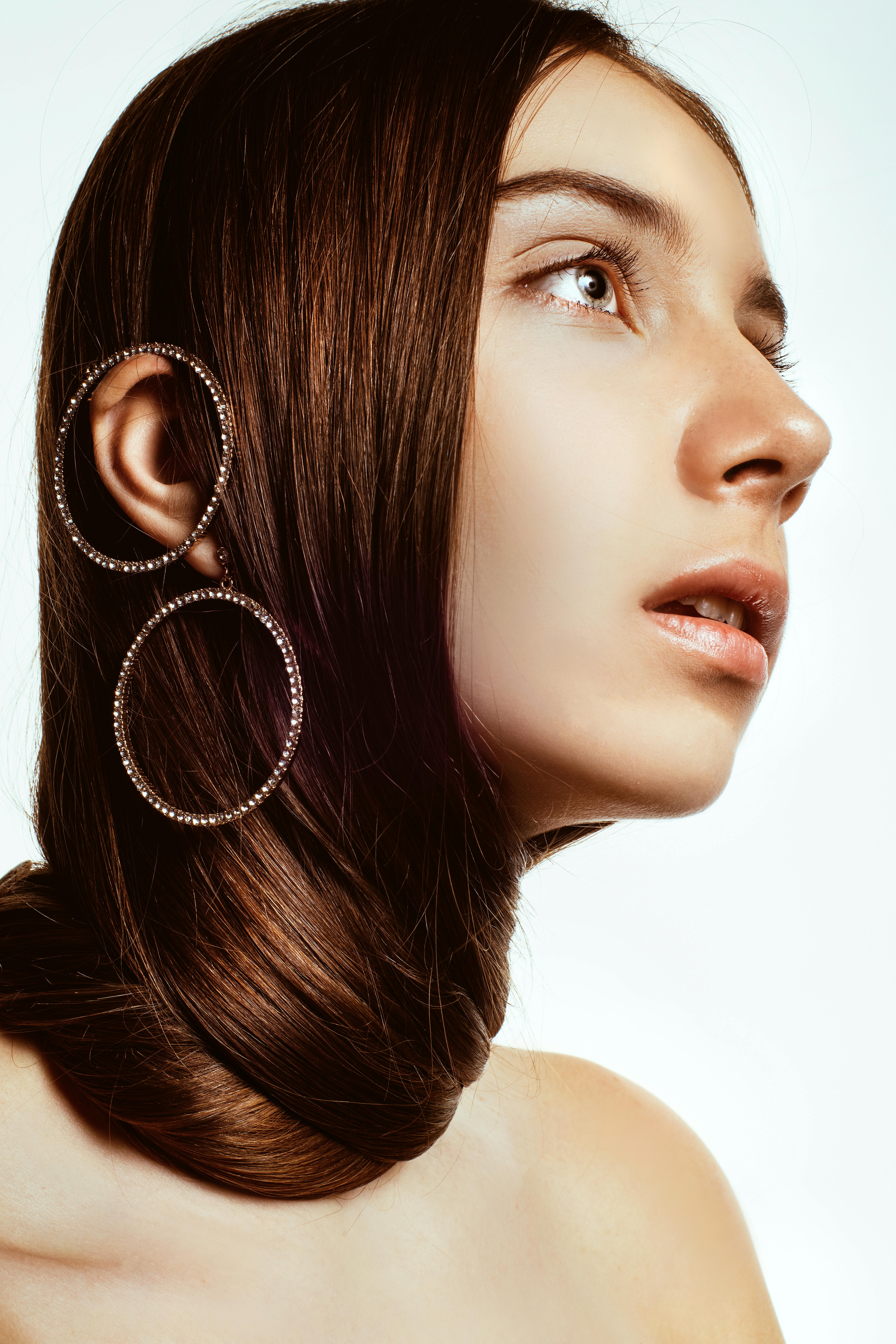 Photo Of Woman Wearing Earings