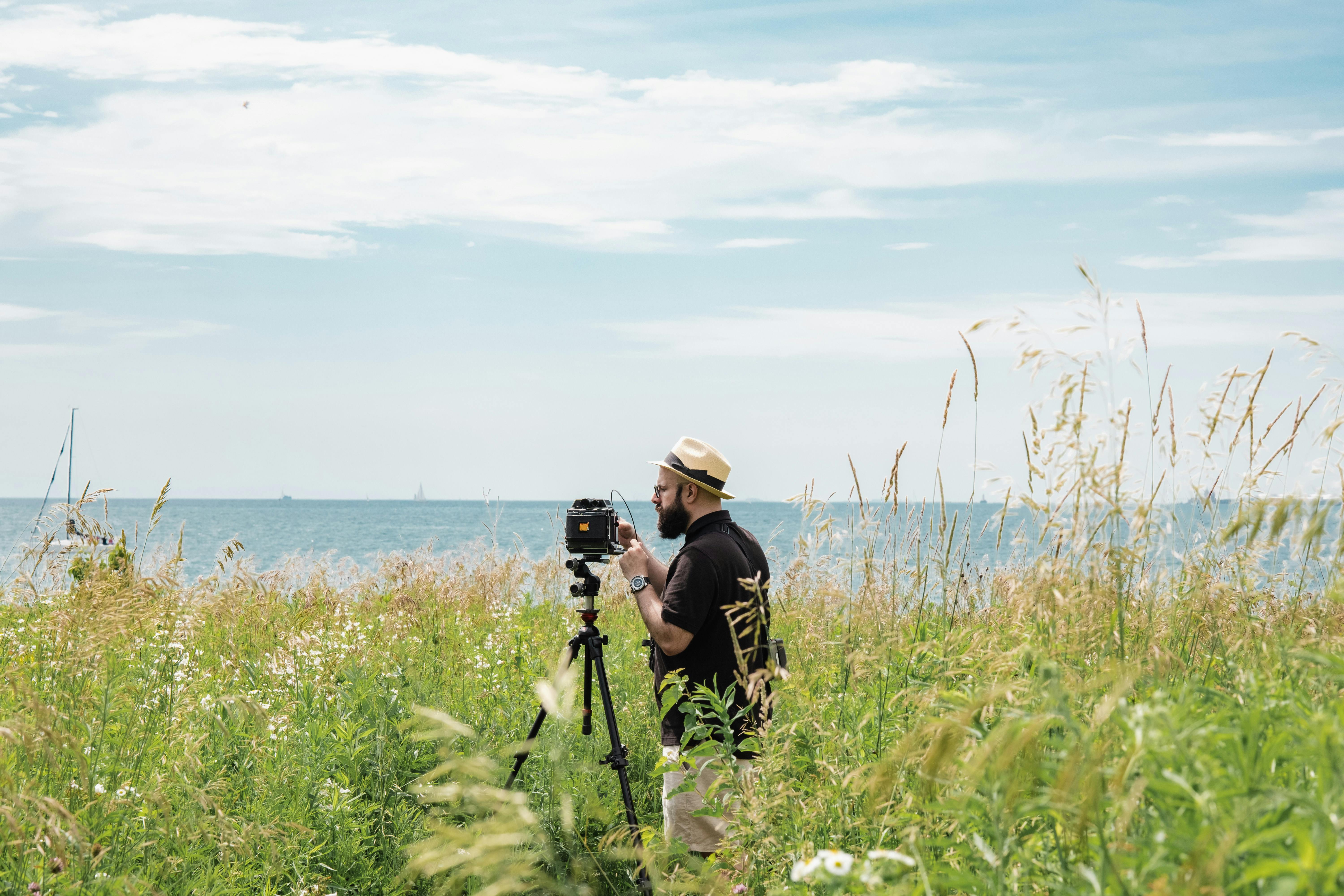 Man Photographing Sea