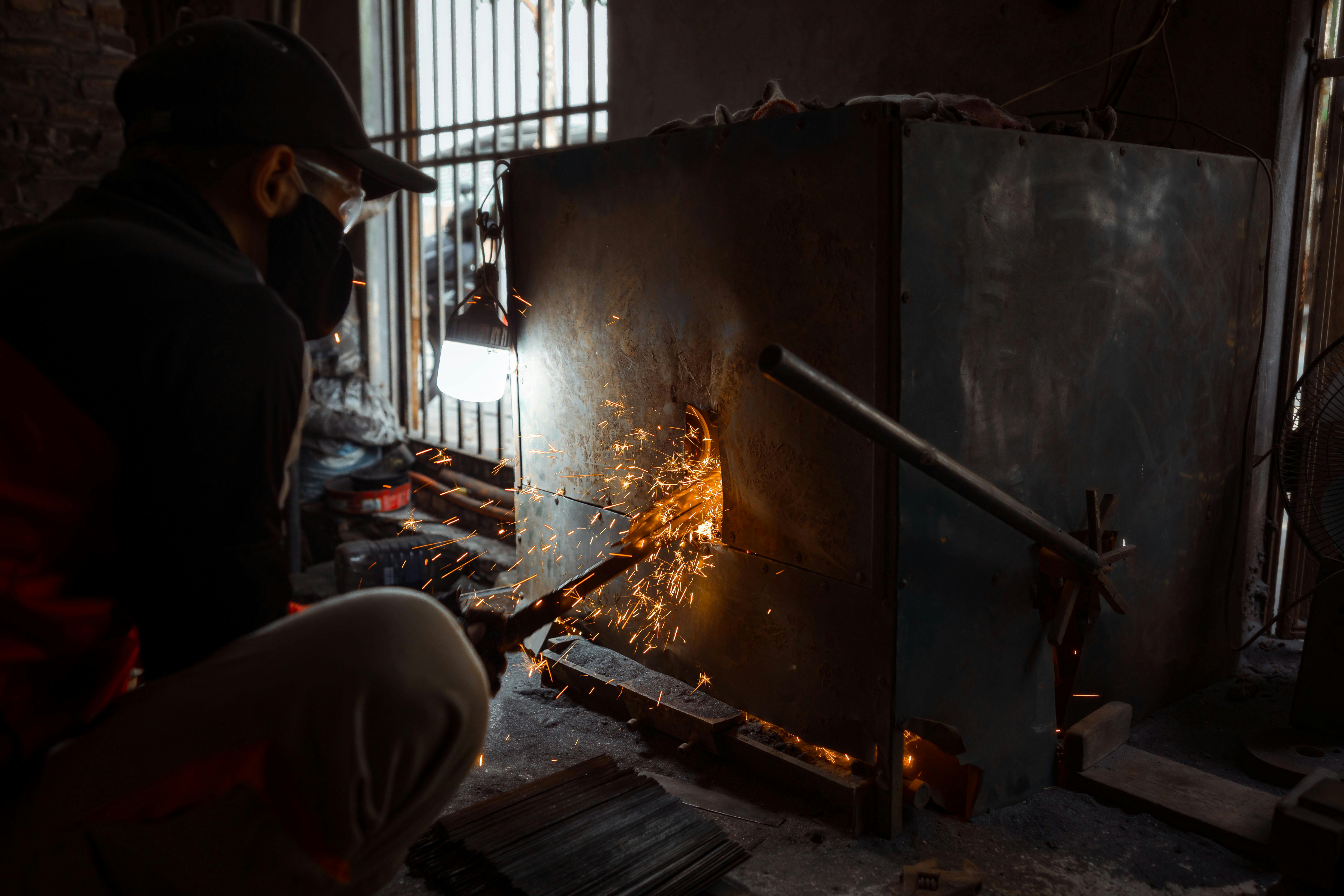 Close-up of Sparks Flying from Metal Grinding Process