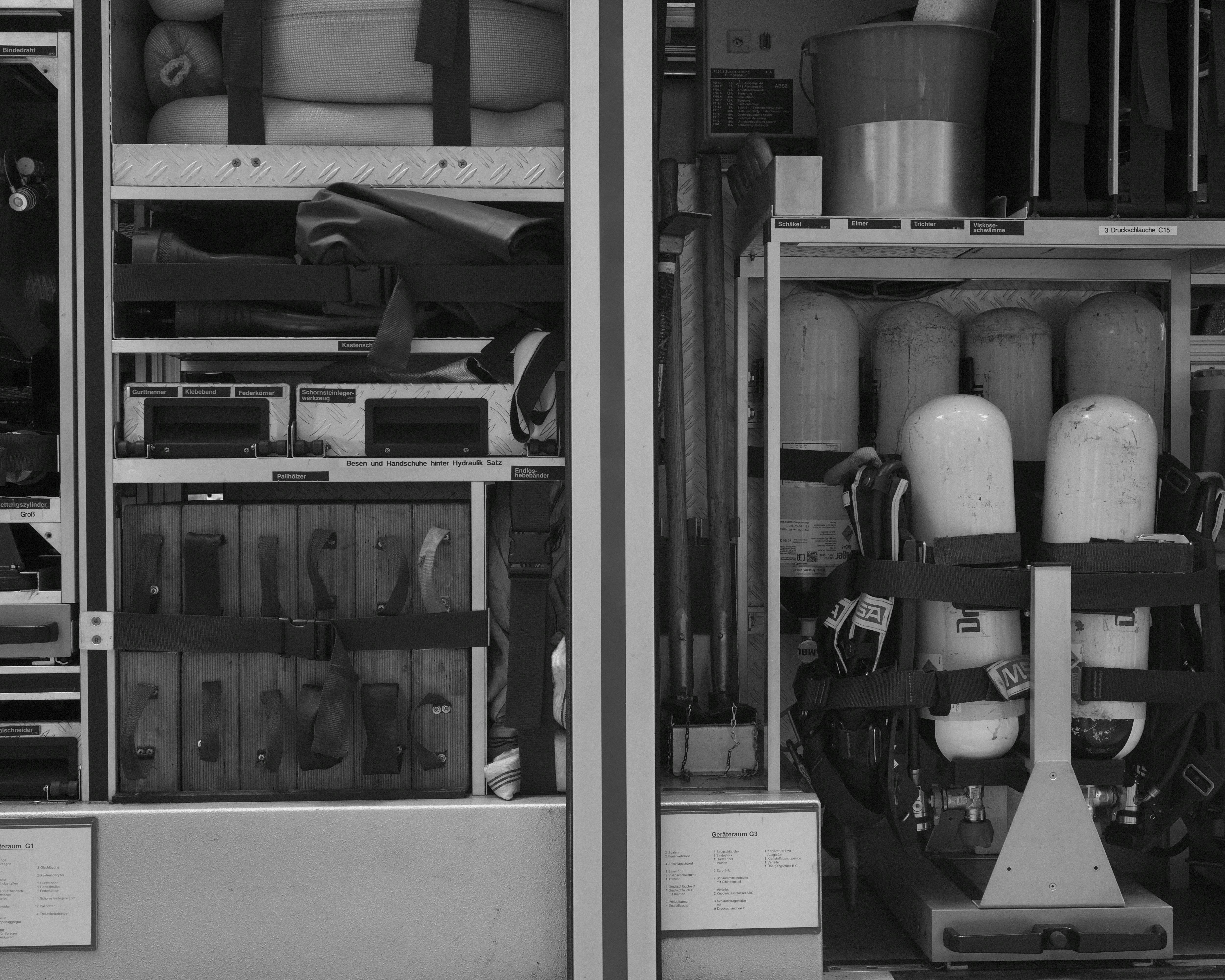 Black and White Photo of the Equipment in a Firetruck
