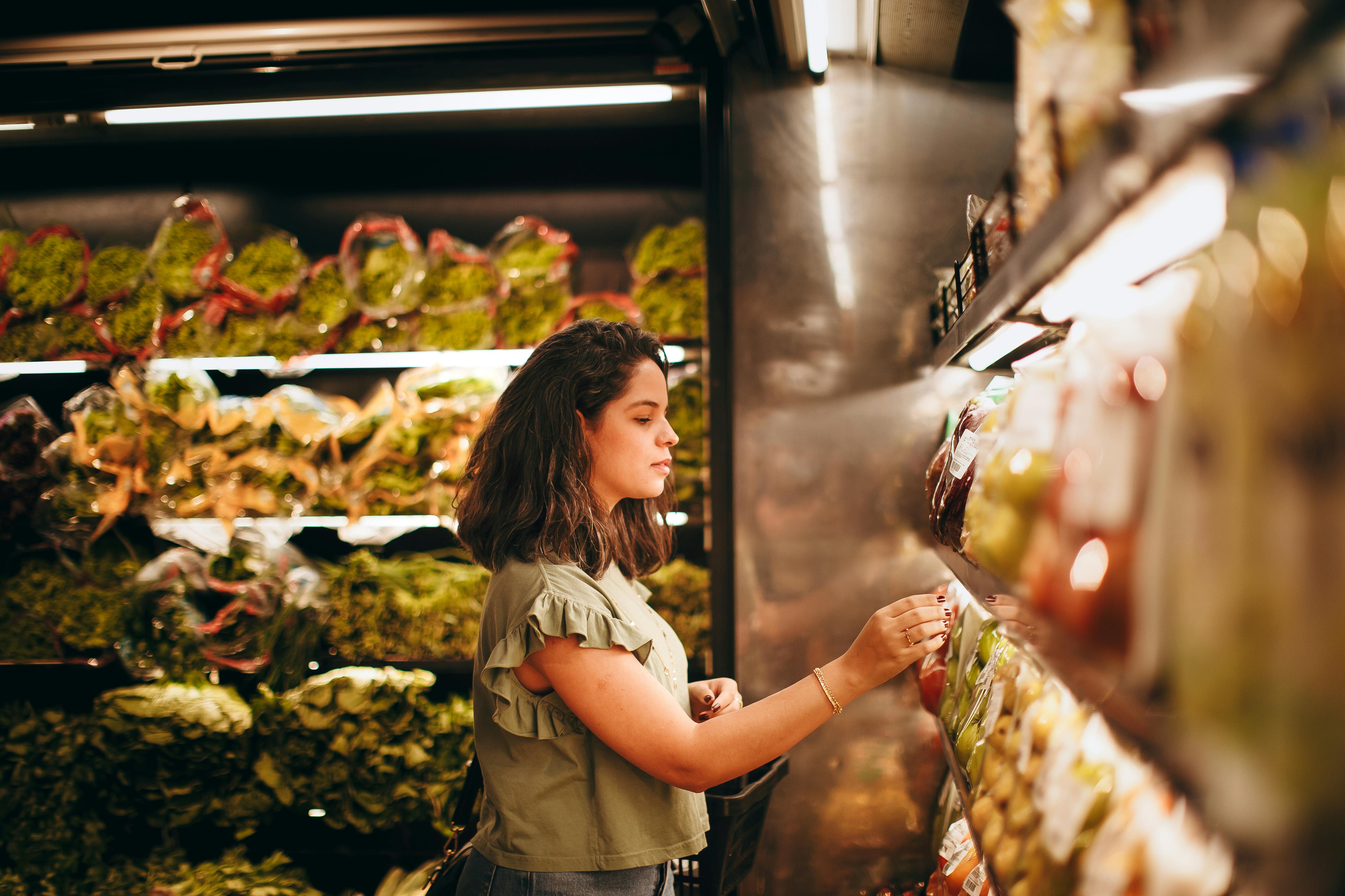 Woman Buying Groceries in a Supermarket