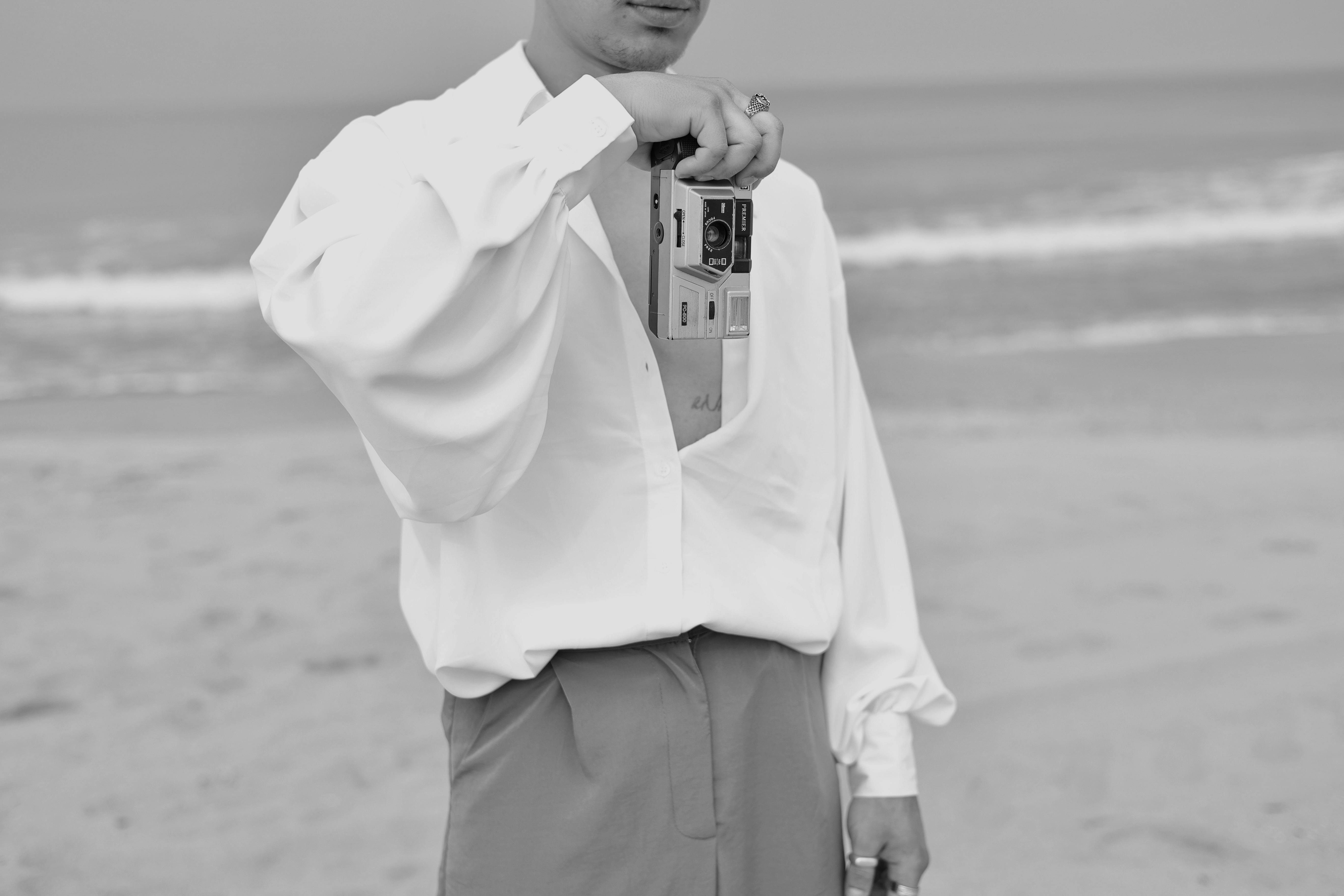 Man with Camera on Beach