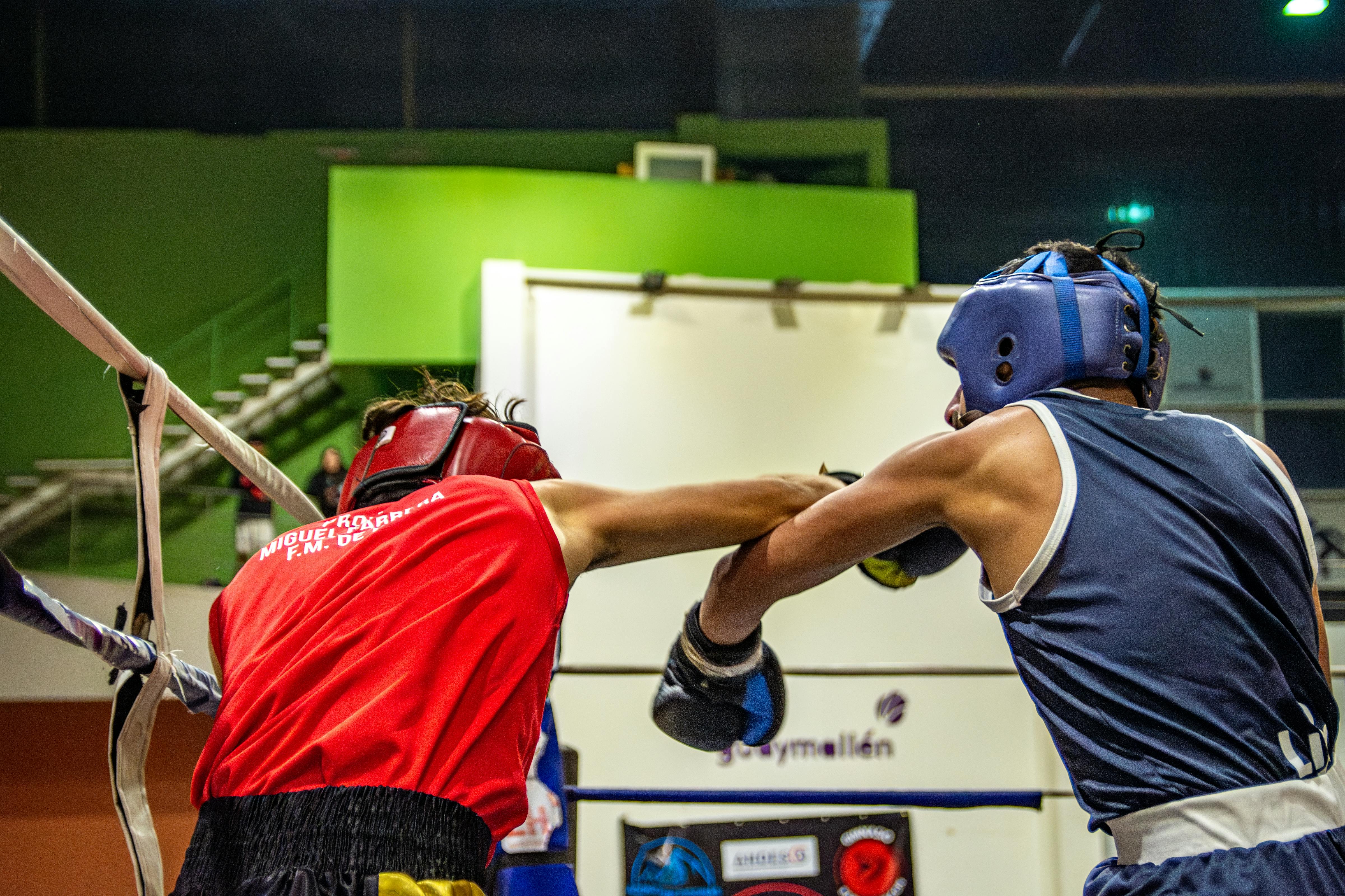 Two boxers in a boxing ring