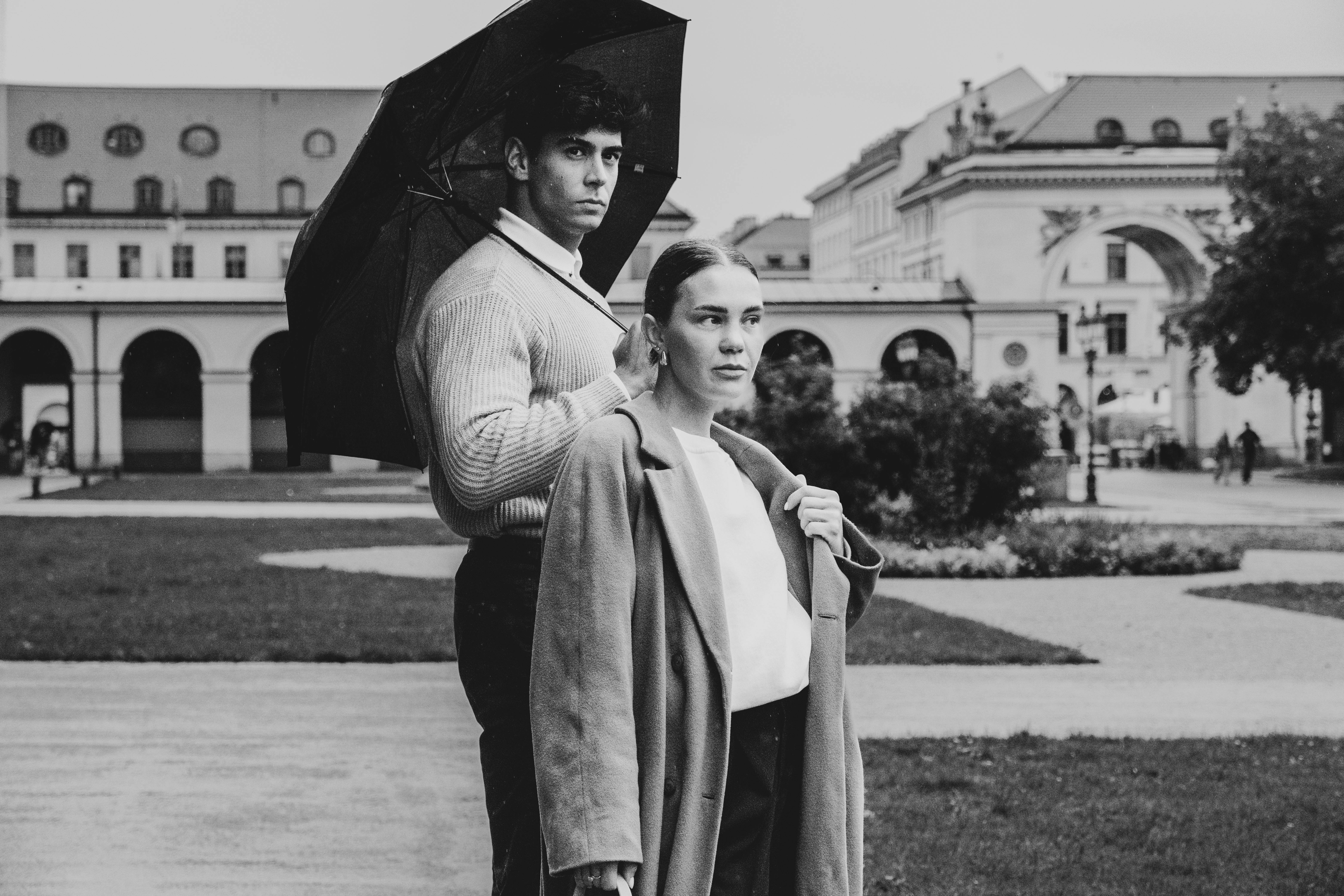 Urban Stroll with Umbrella in Black and White