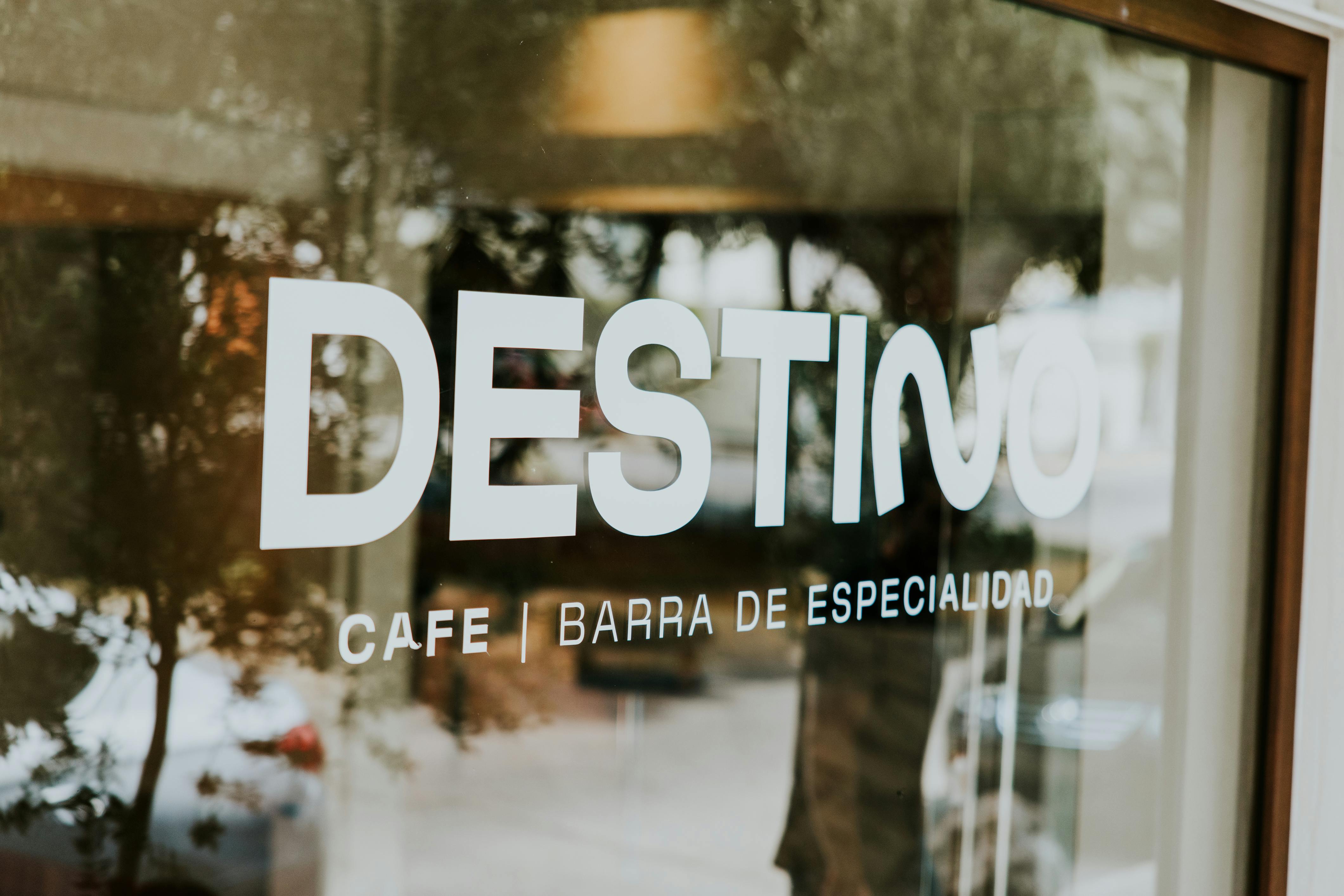 Close-up View of Cafe Destino Sign