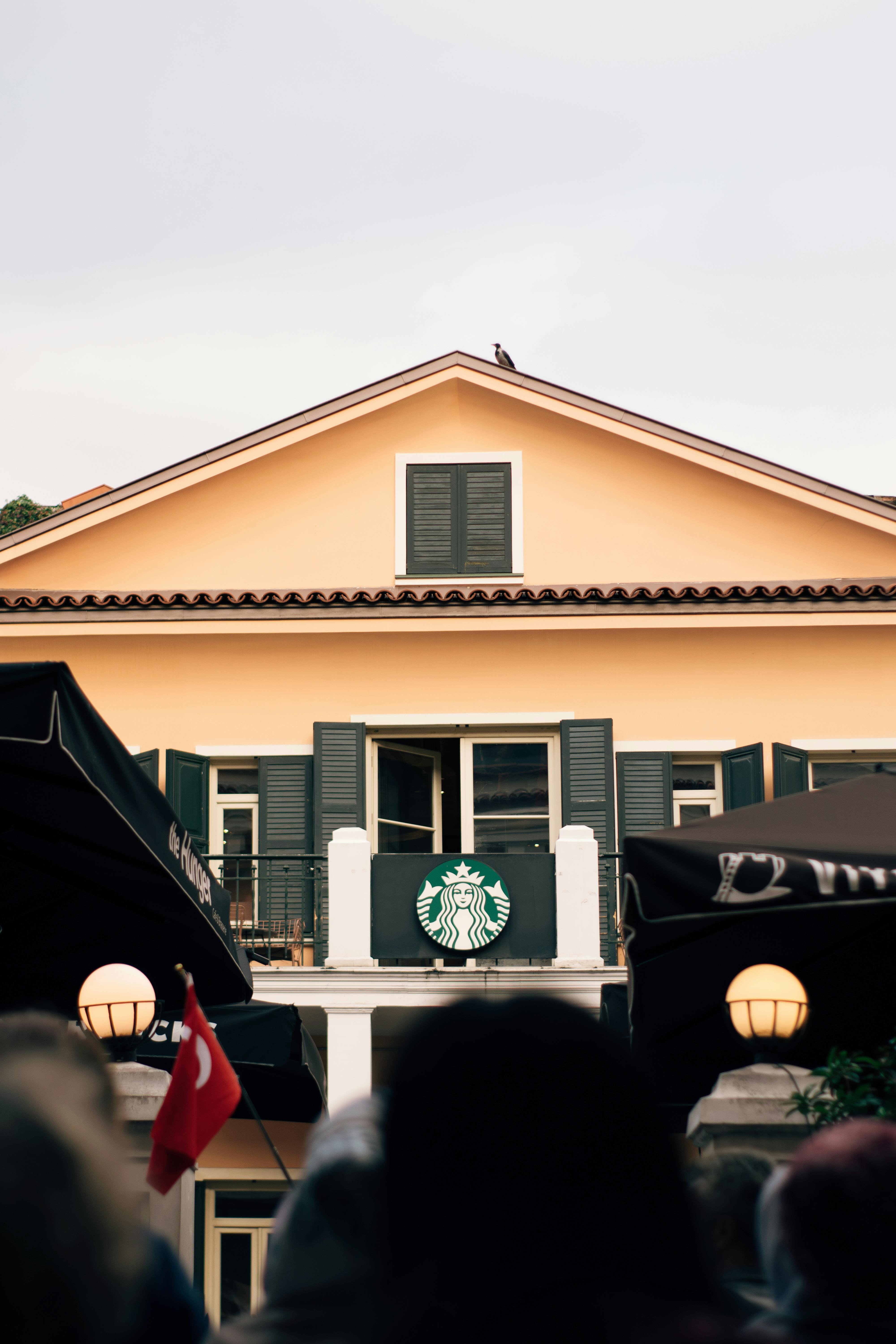 Charming Café Facade with Iconic Logo