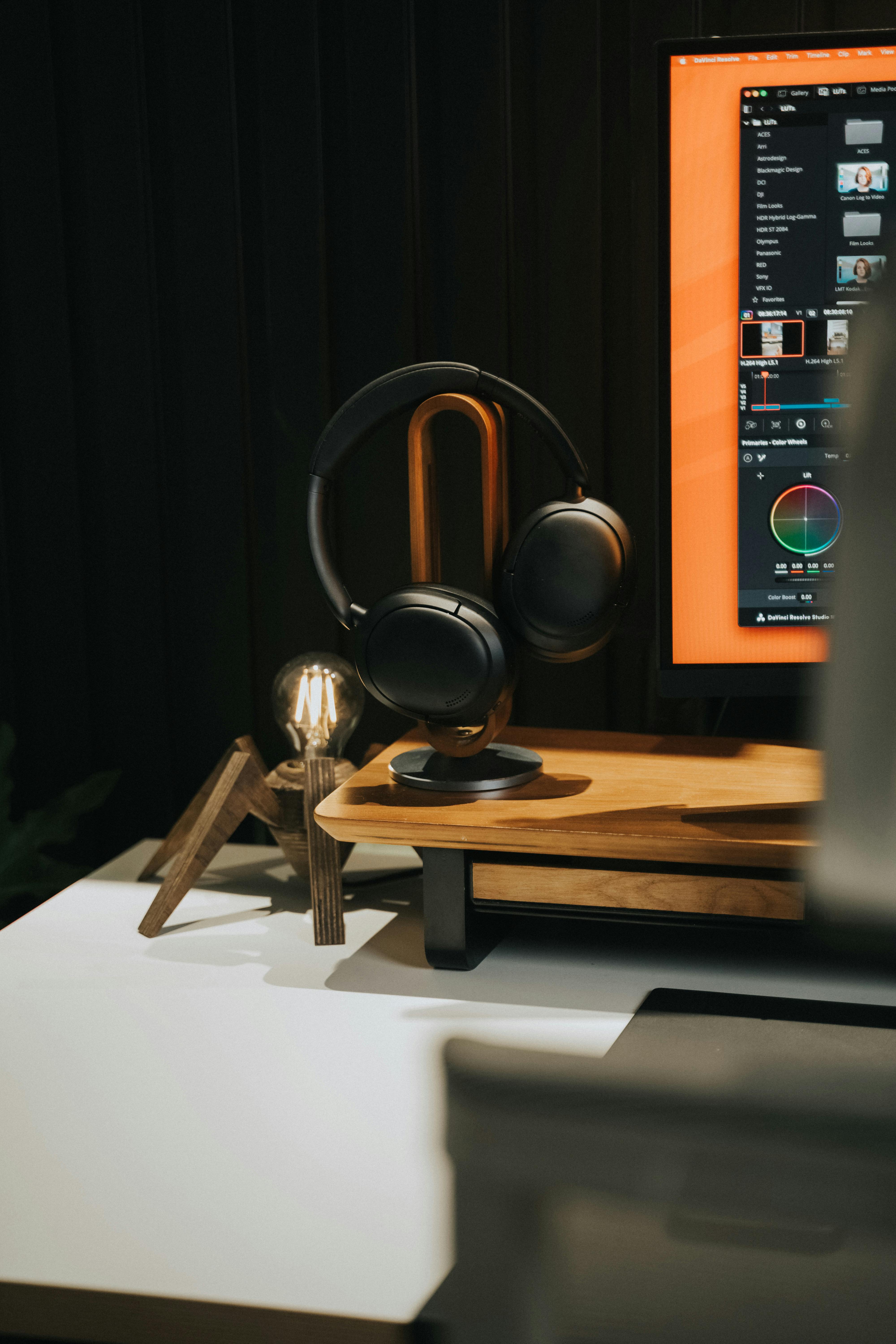 Elegant Desk Setup with Headphones and Monitor