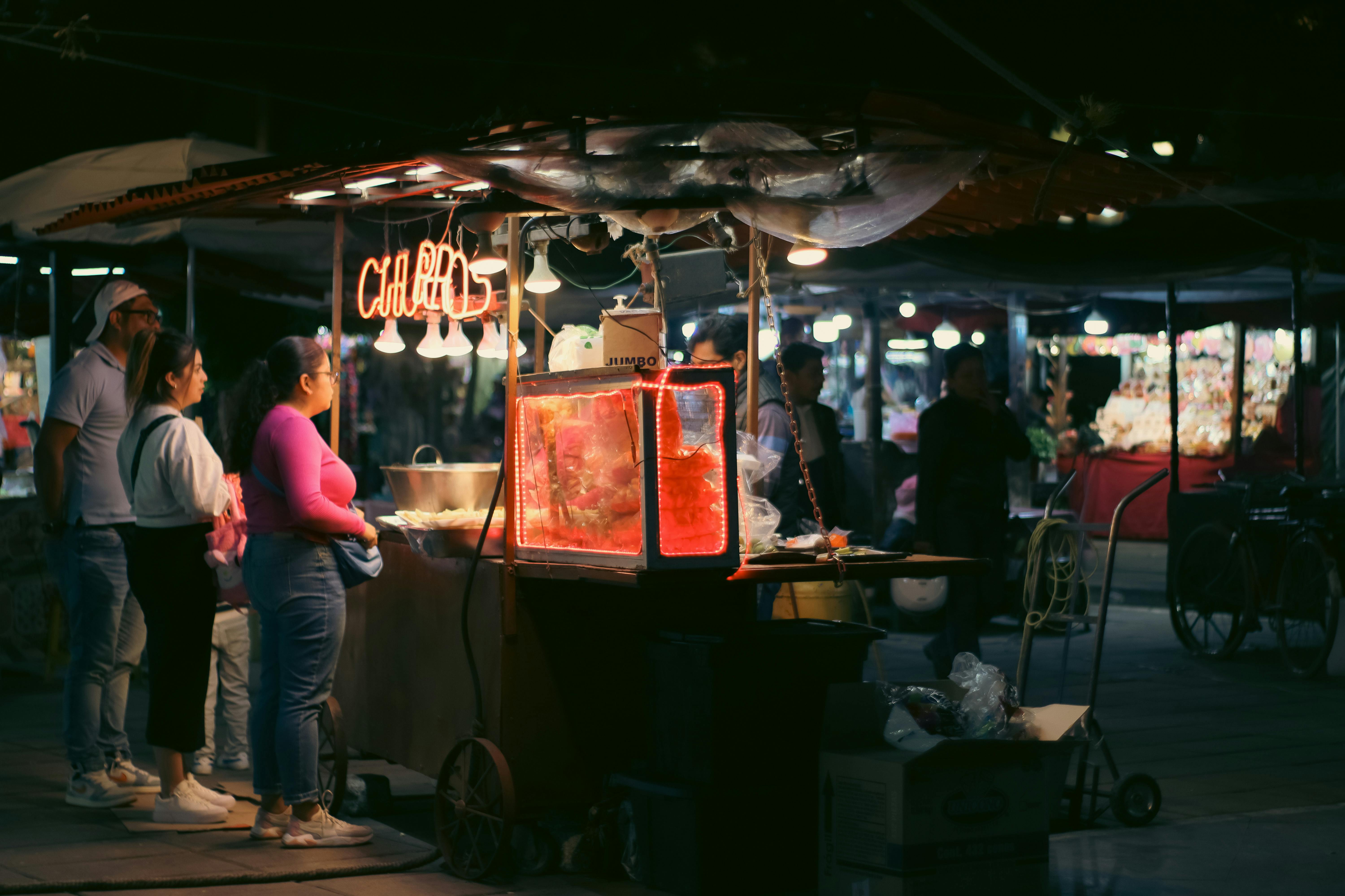 Vibrant Night Market with Lively Vendor Stalls