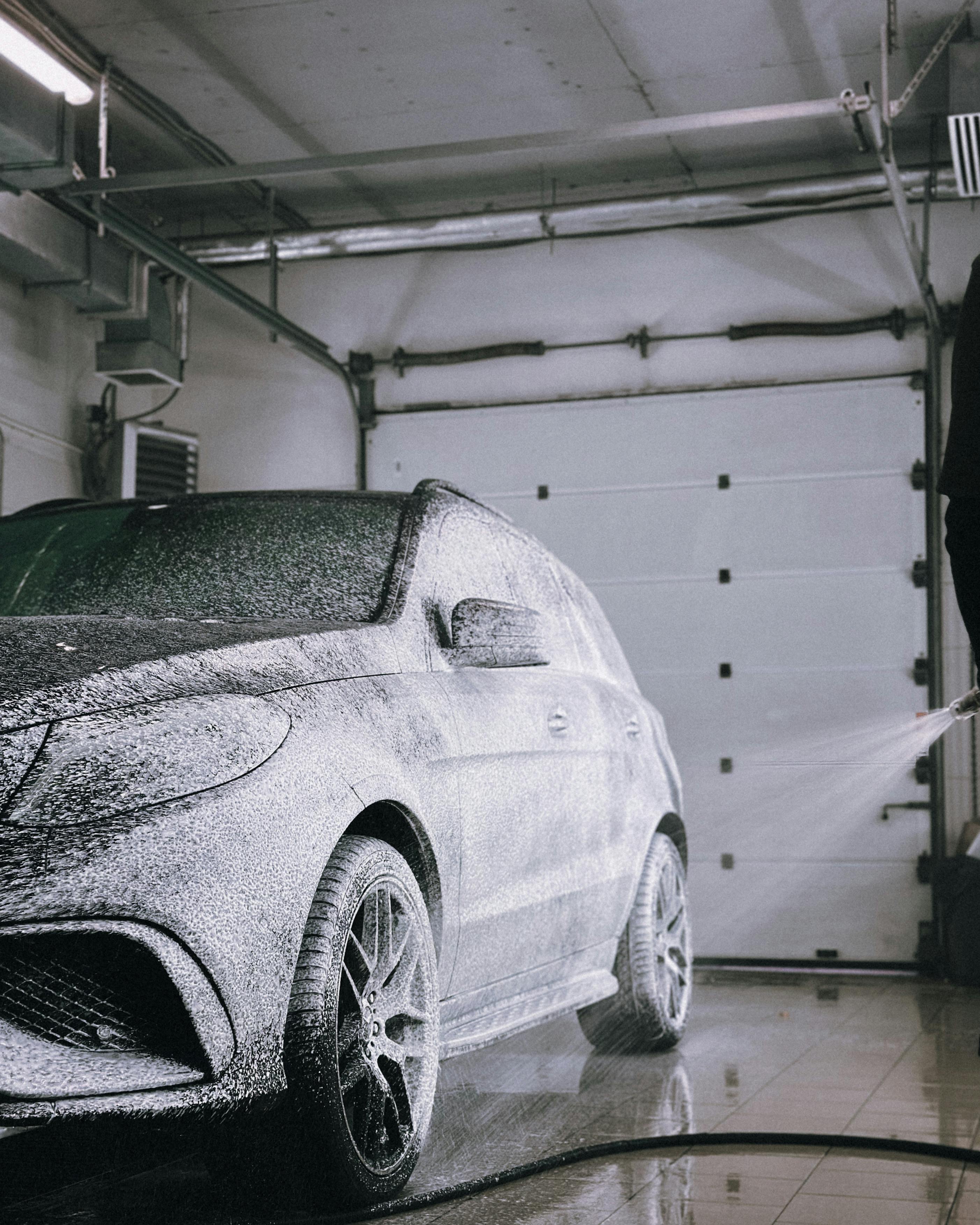 Luxury Car Being Washed in Garage