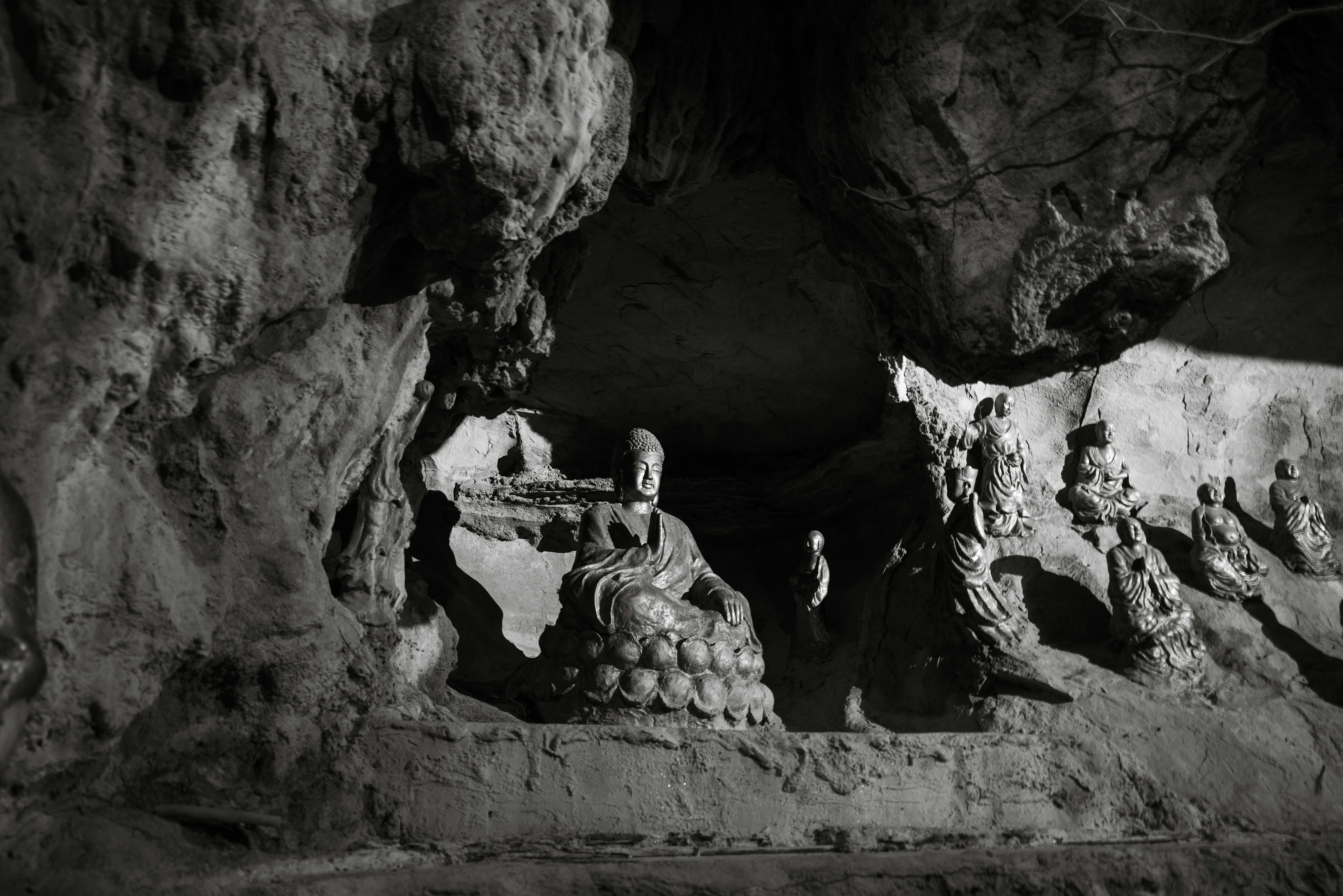 Serene Buddha Statues in a Mysterious Cave