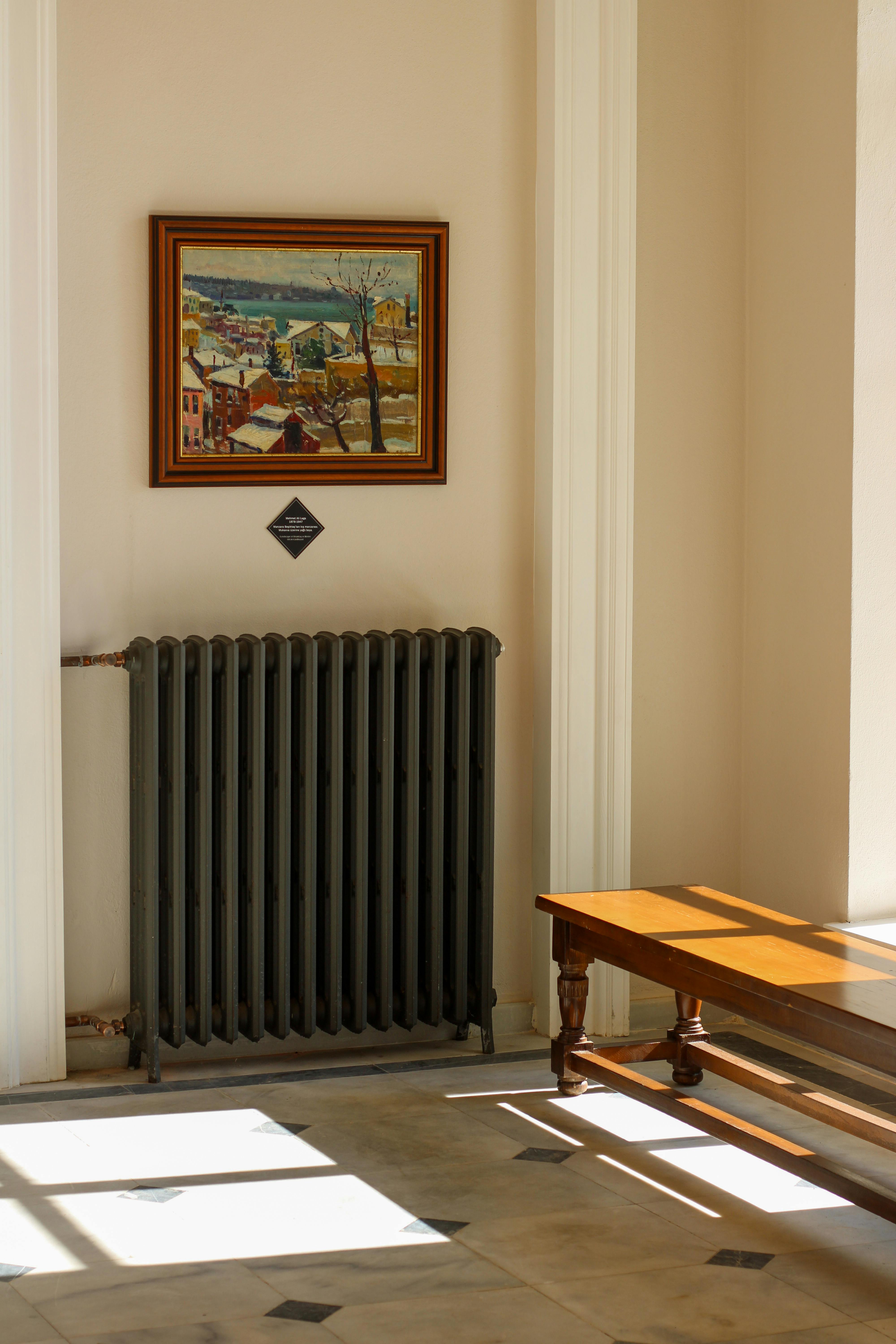 Sunlit Interior with Art and Radiator