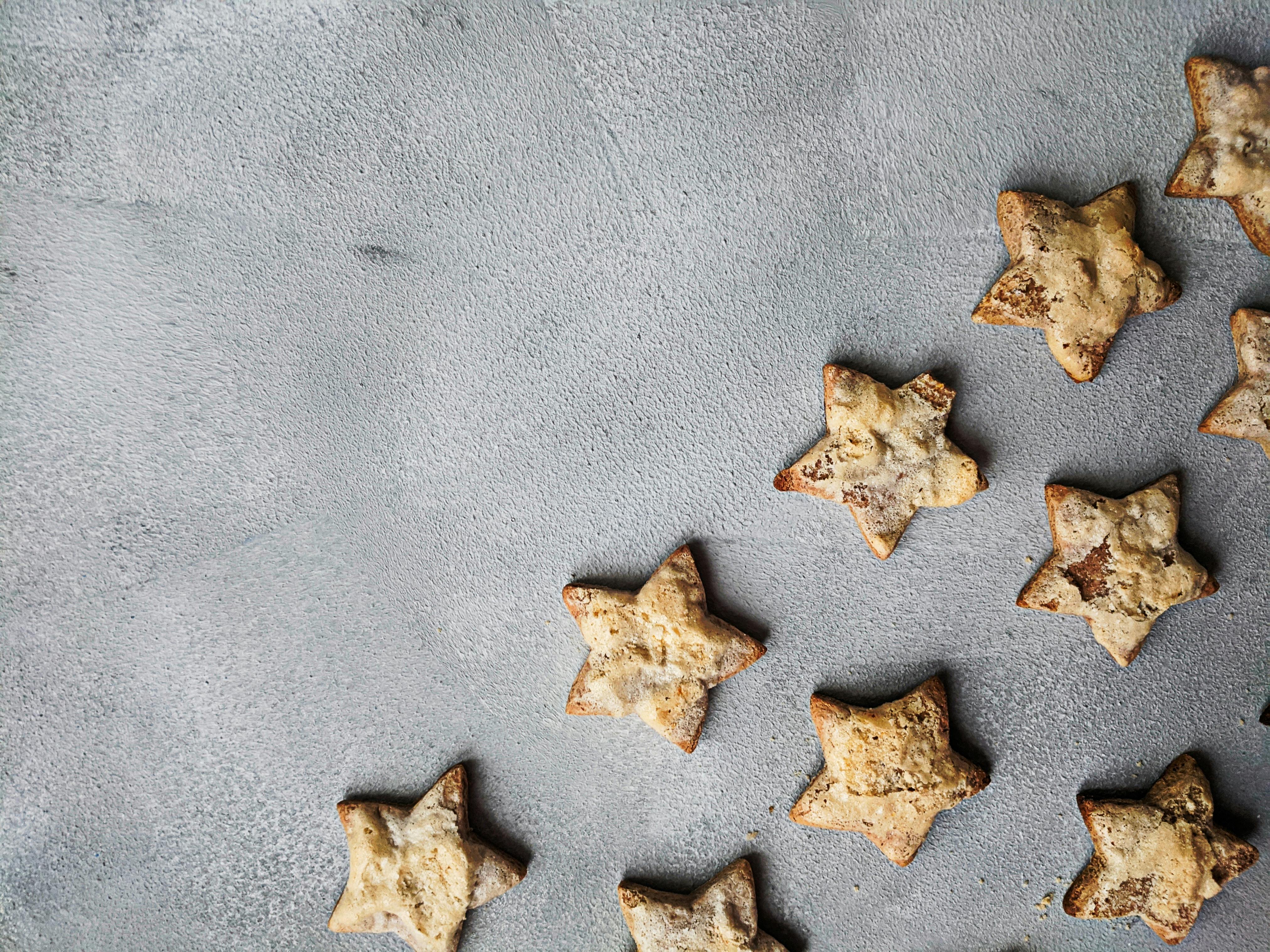 Brown Star Shaped Cookies on Gray Surface
