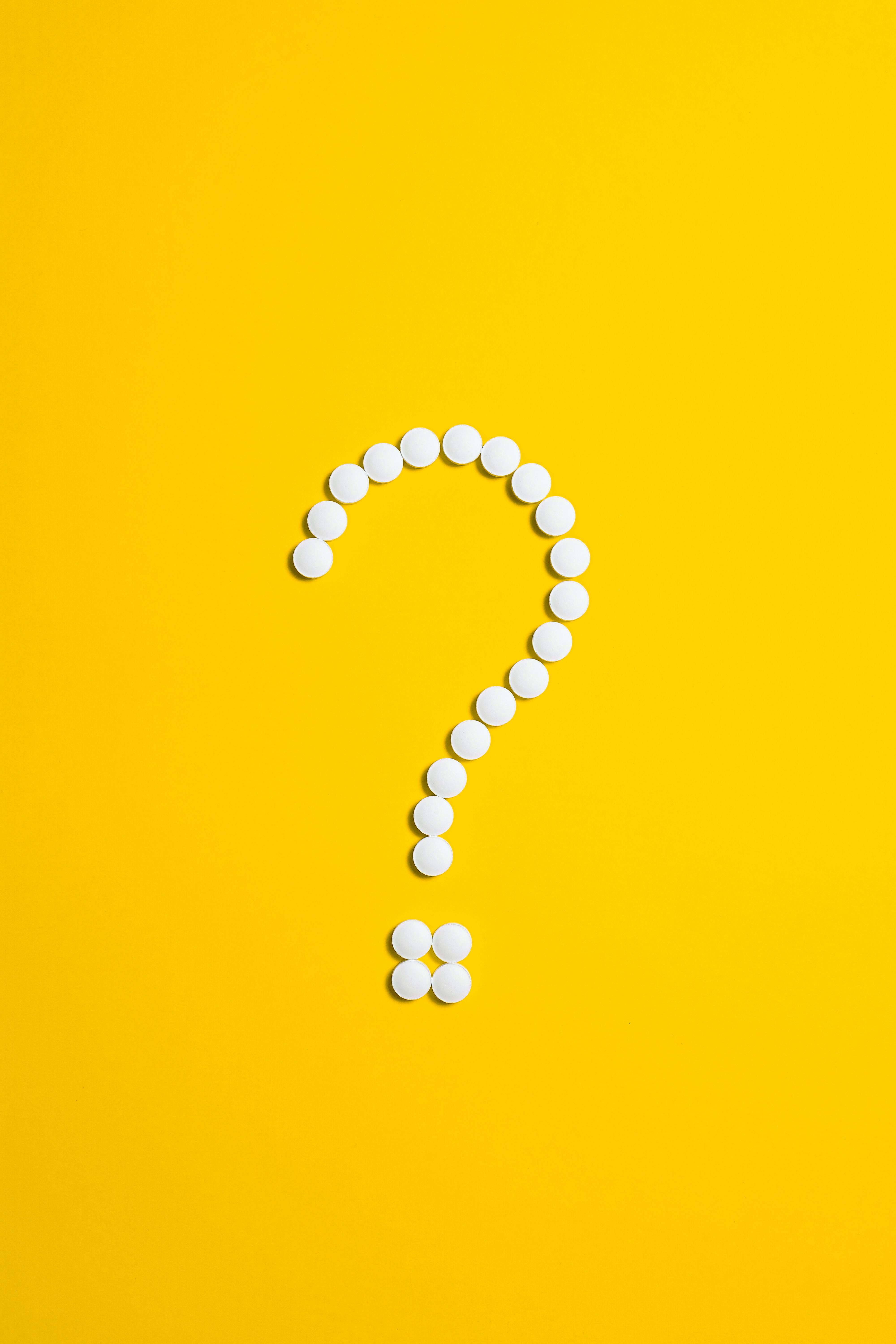 Question Mark on Yellow Background