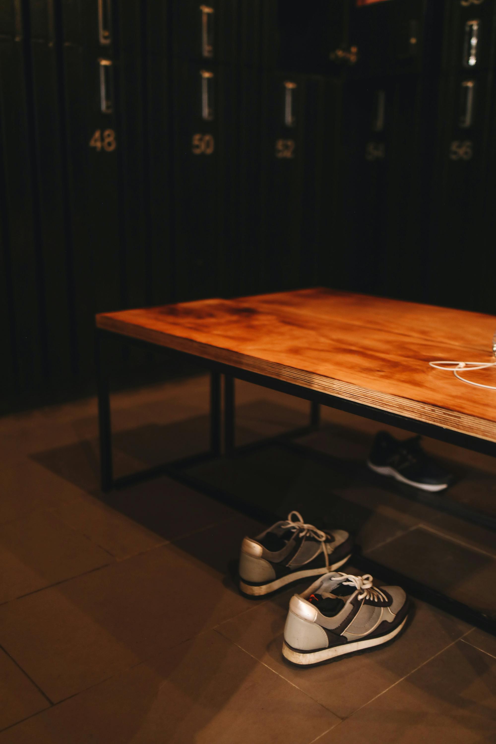 Sneakers Under A Wooden Bench