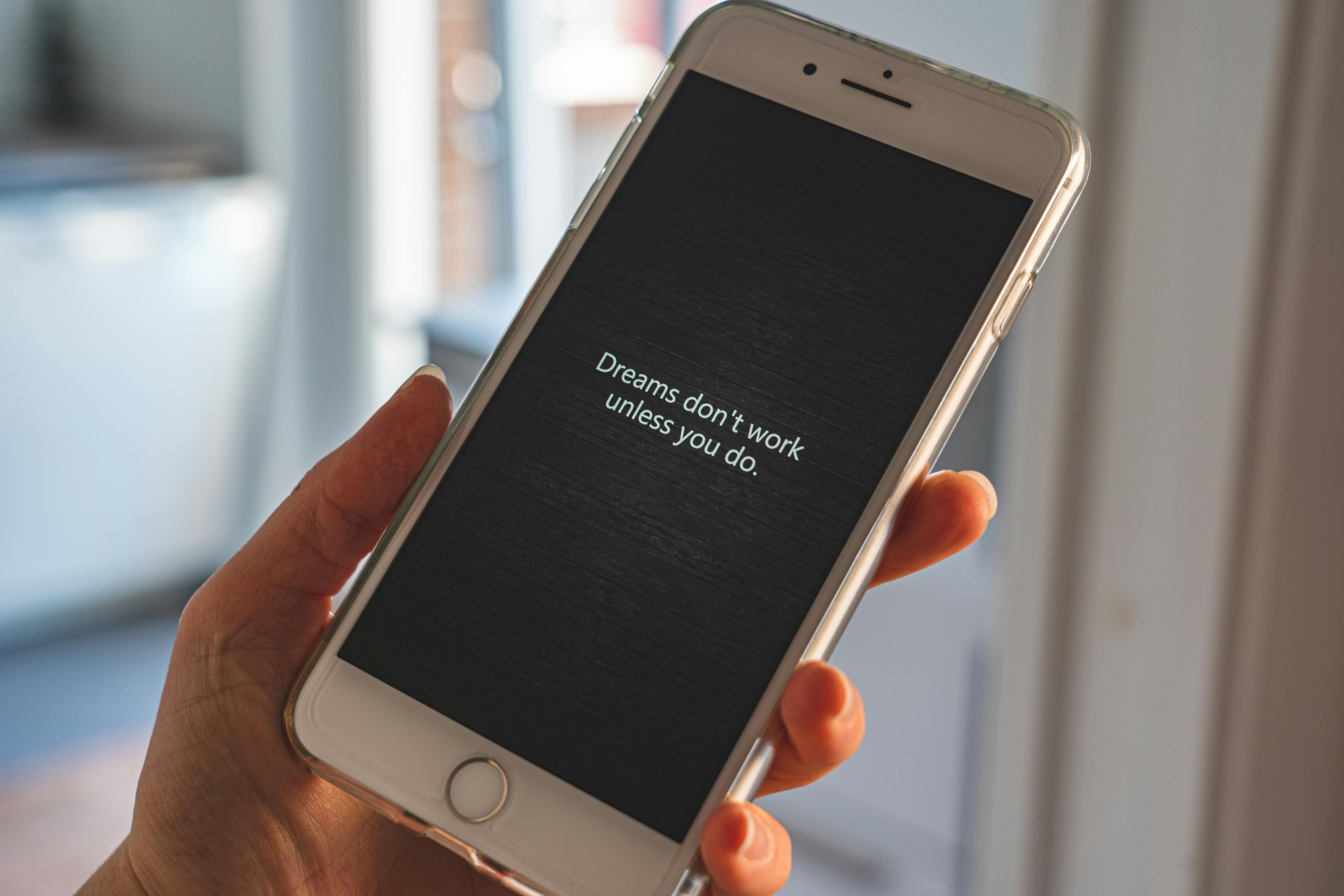 Person Holding Iphone 6