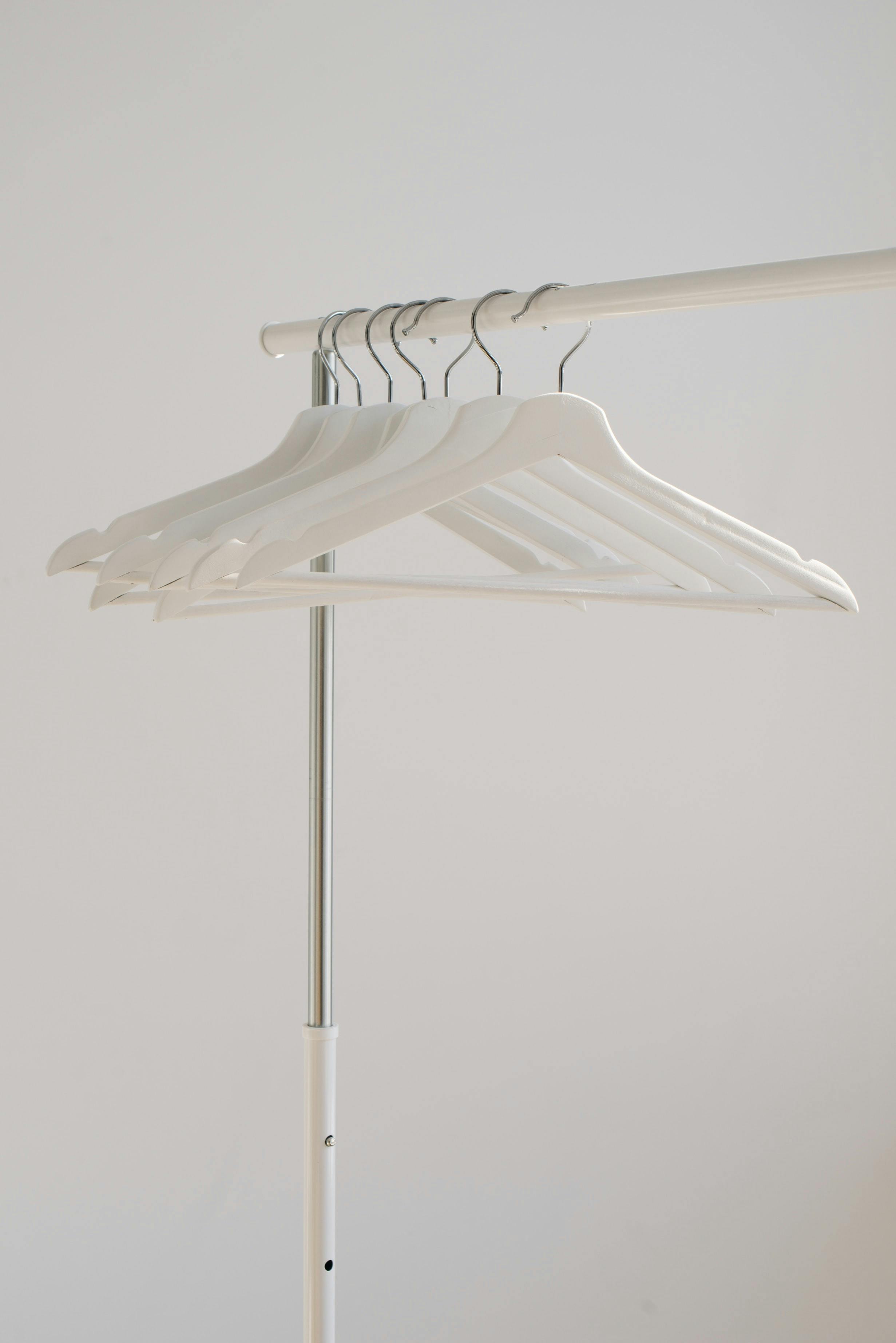 Clothes Hangers Hanging on a Clothes Rack