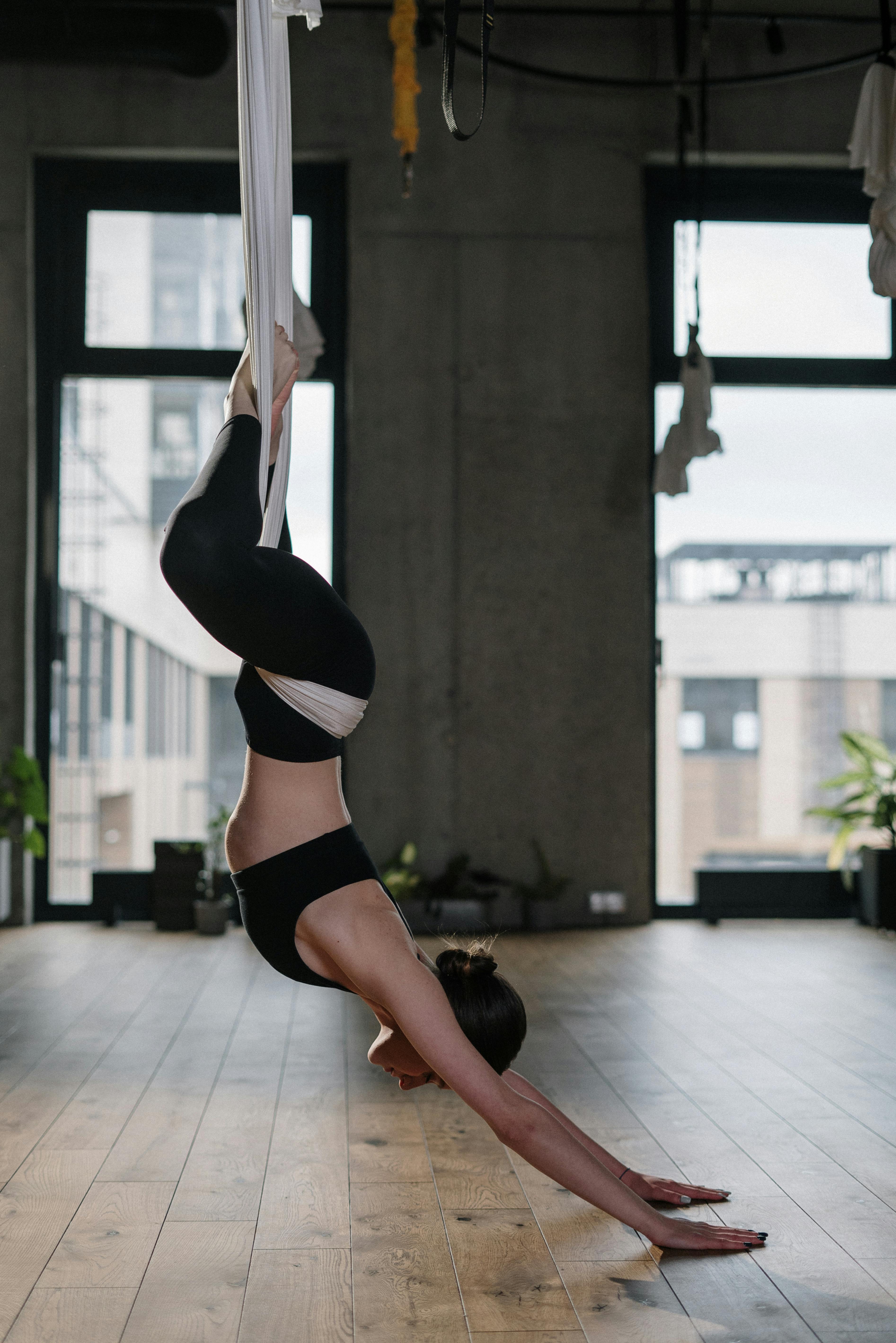 Woman in Black Sports Bra and Black Panty Doing Yoga