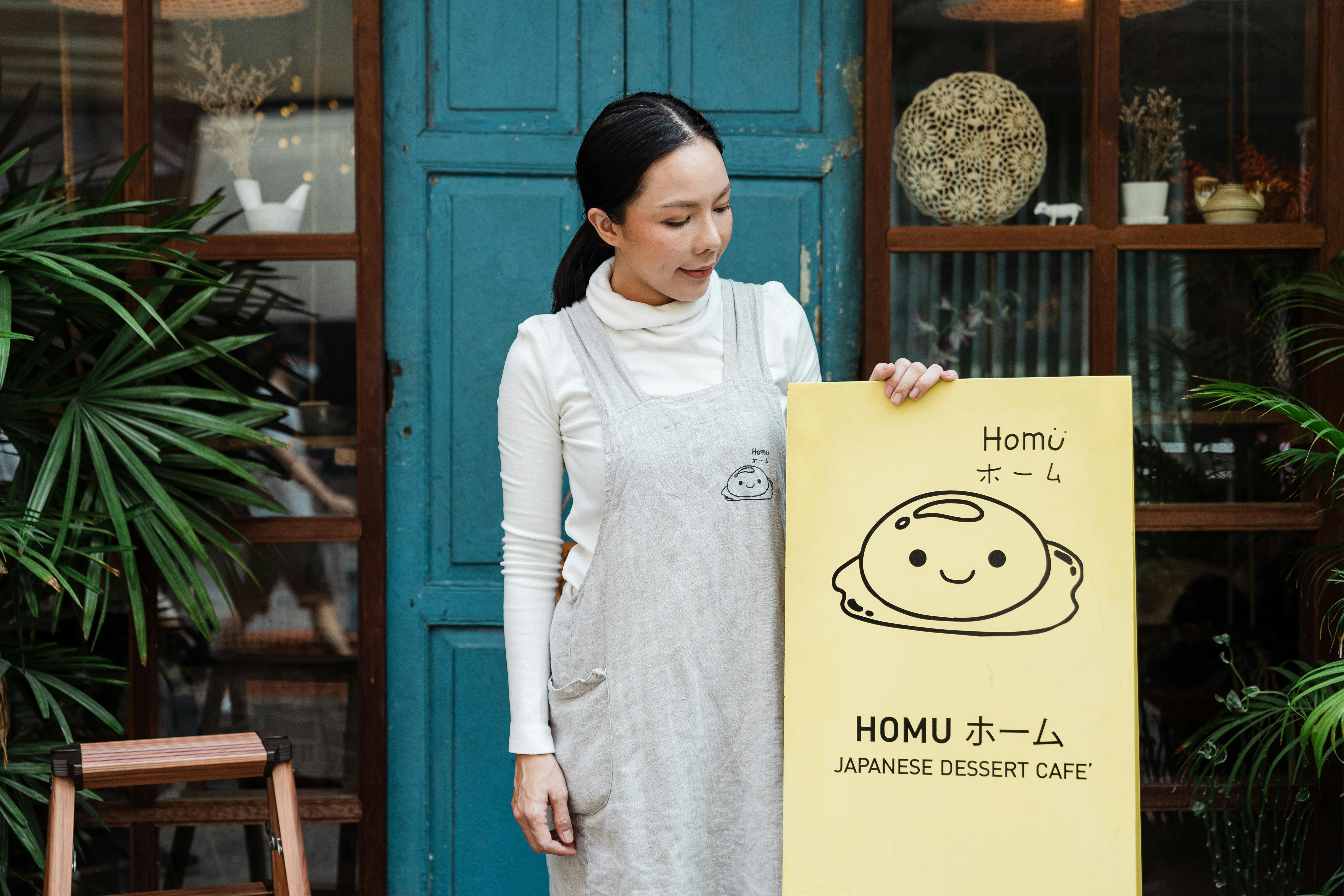 Image of Woman Looking at Her Signage