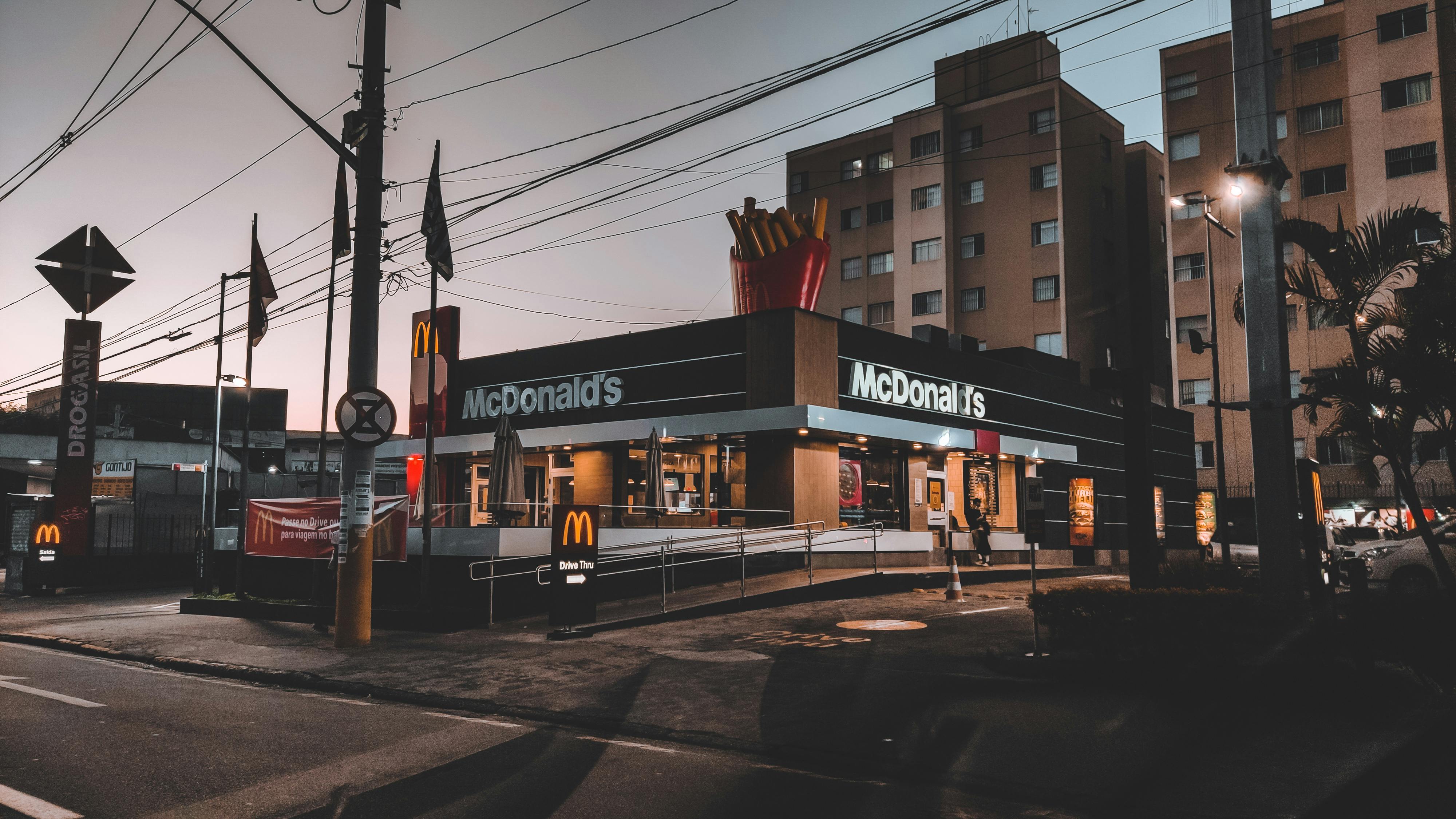 Empty street in suburb area with small fast food restaurant