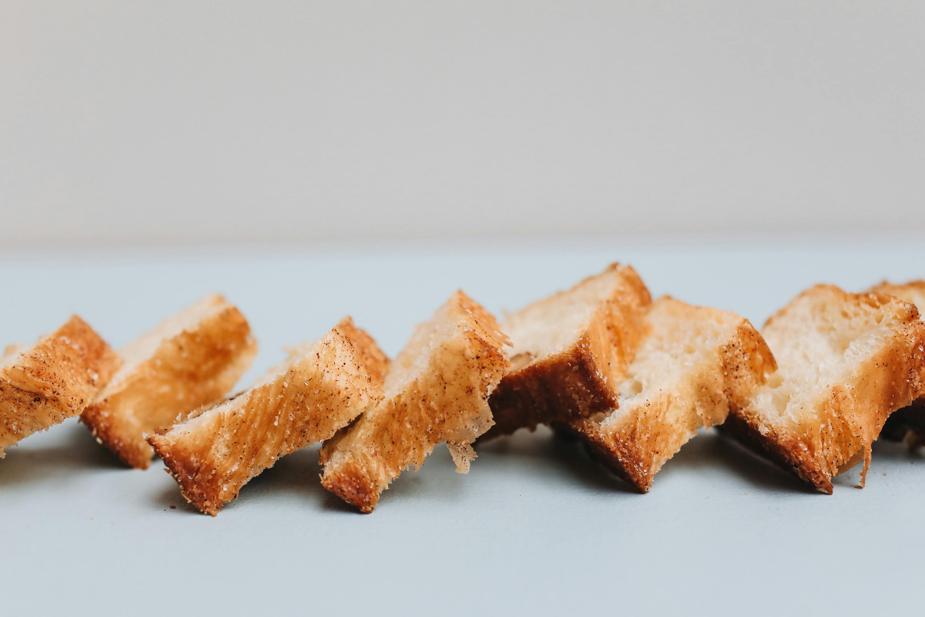 Close-Up Photograph of Slices of Brown Bread