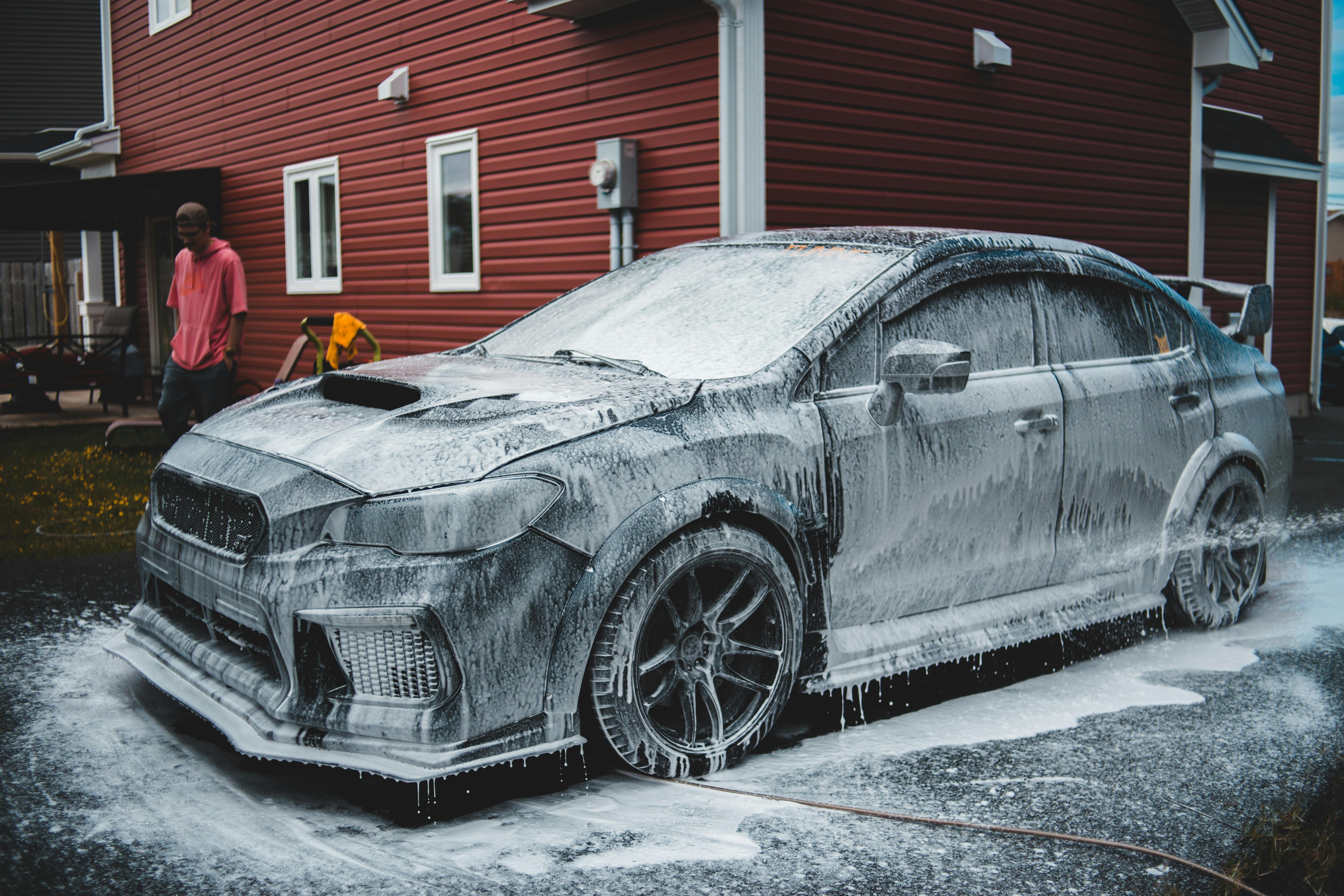 Picture of a Worker and Car Wash