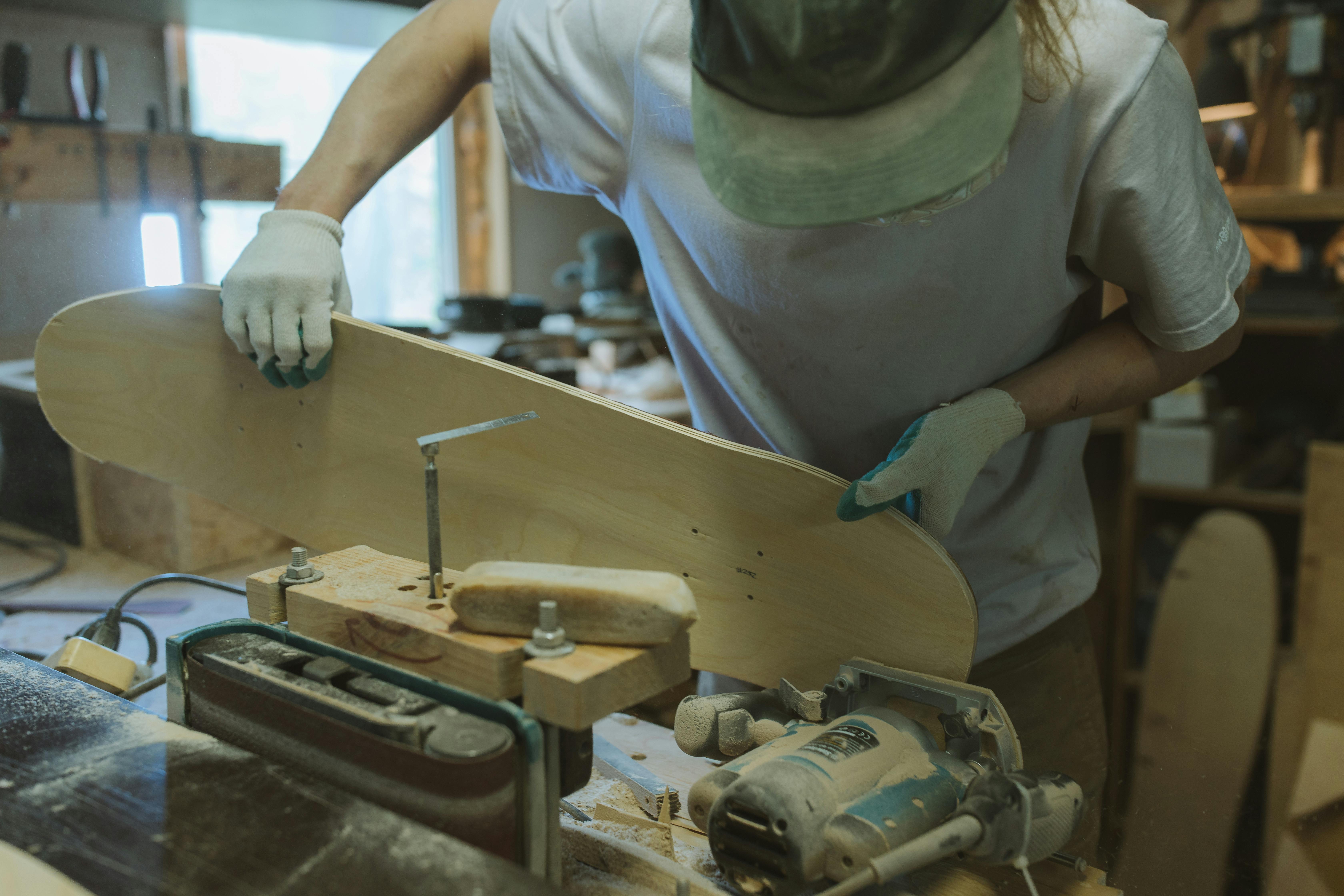 Craftsman making a Skateboard