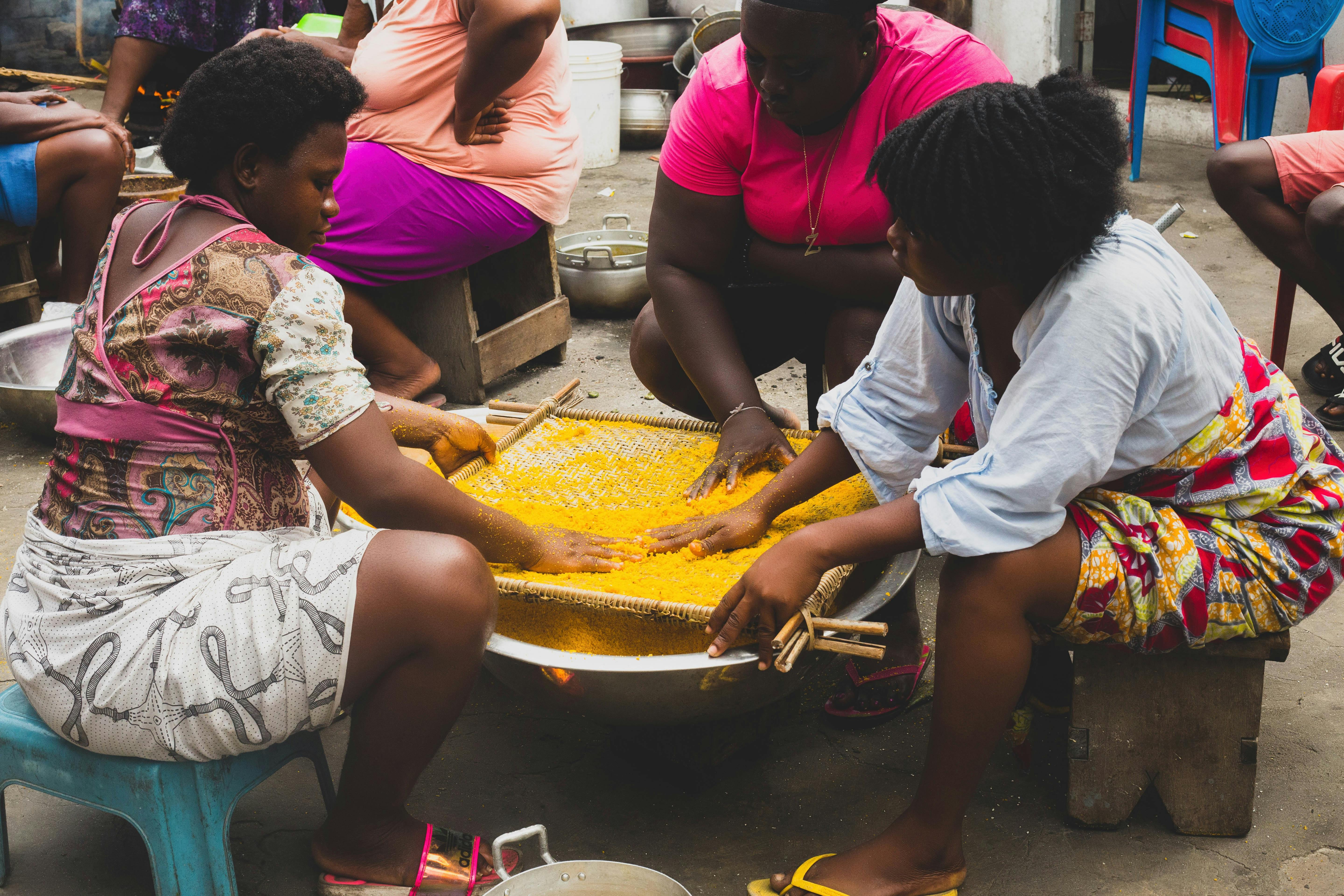 Black women with spices on street