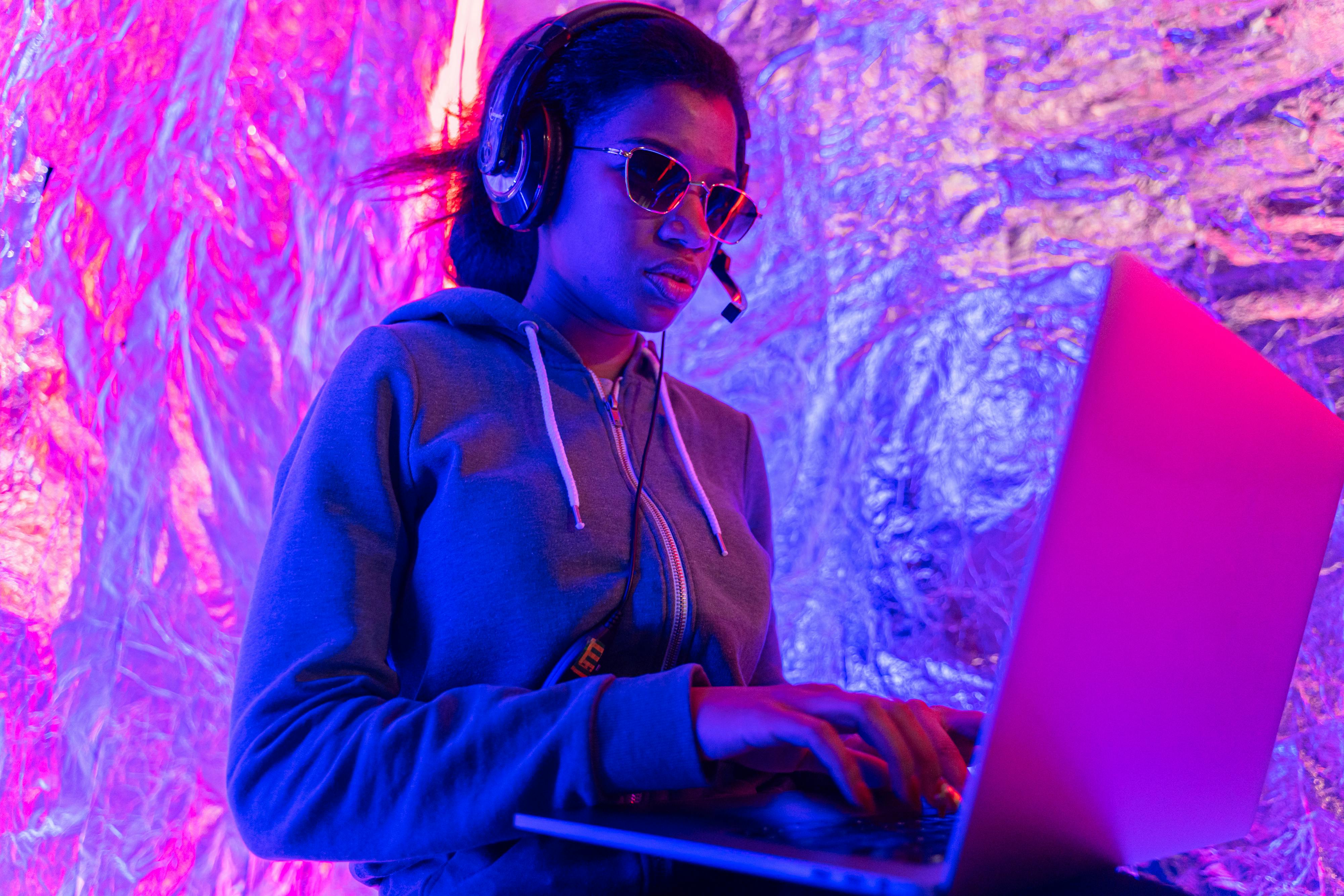 Woman in Blue Zip Up Jacket Wearing Black Sunglasses