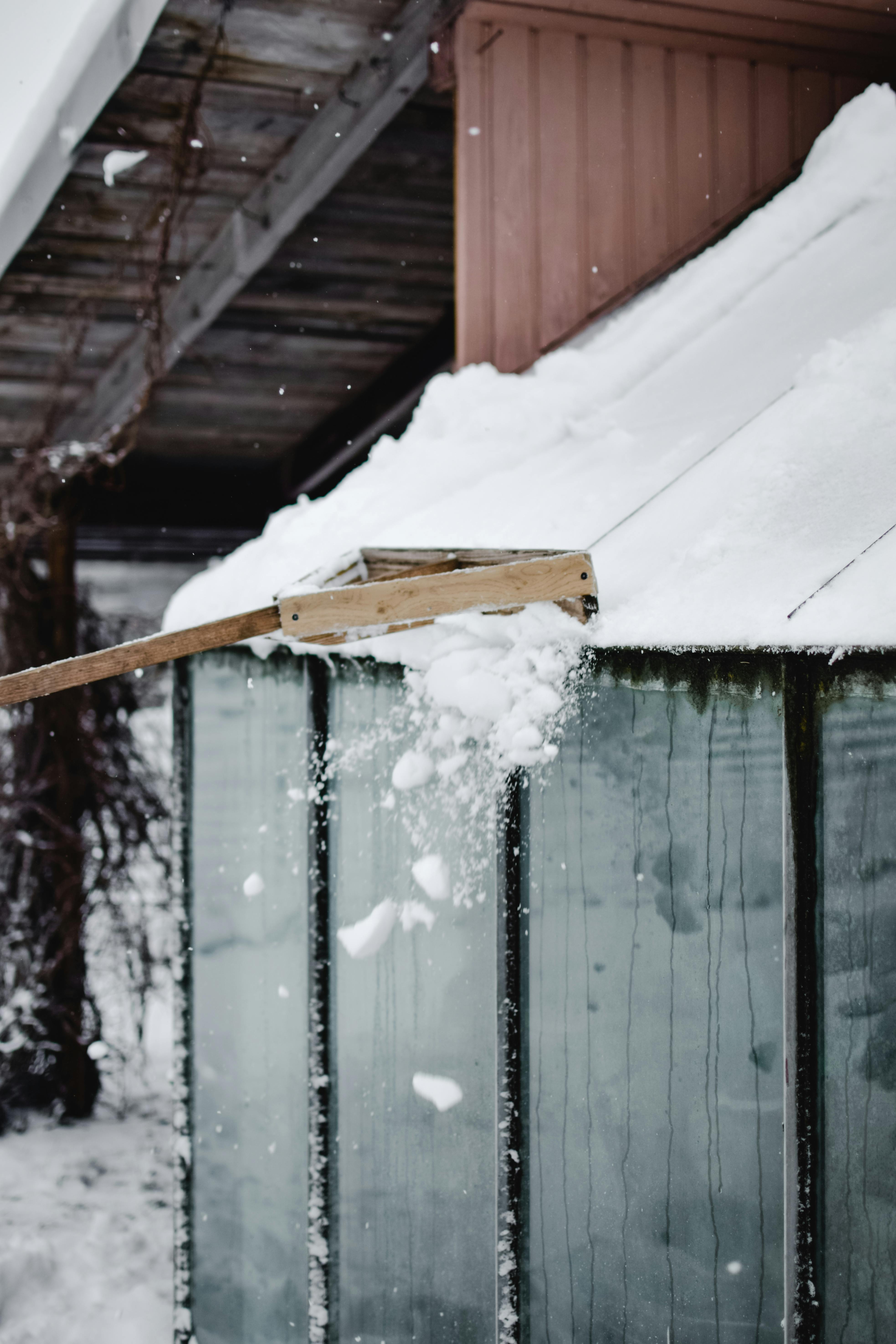 Clearing of Snow from Shed Roof