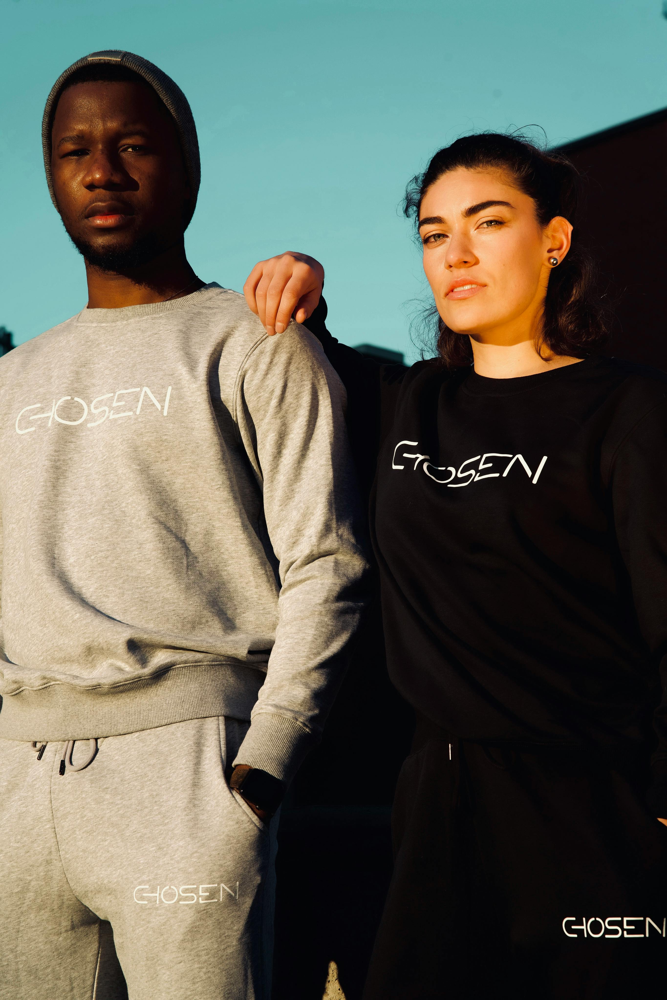 A Couple Wearing Chosen Brand Sweatshirts and Joggers