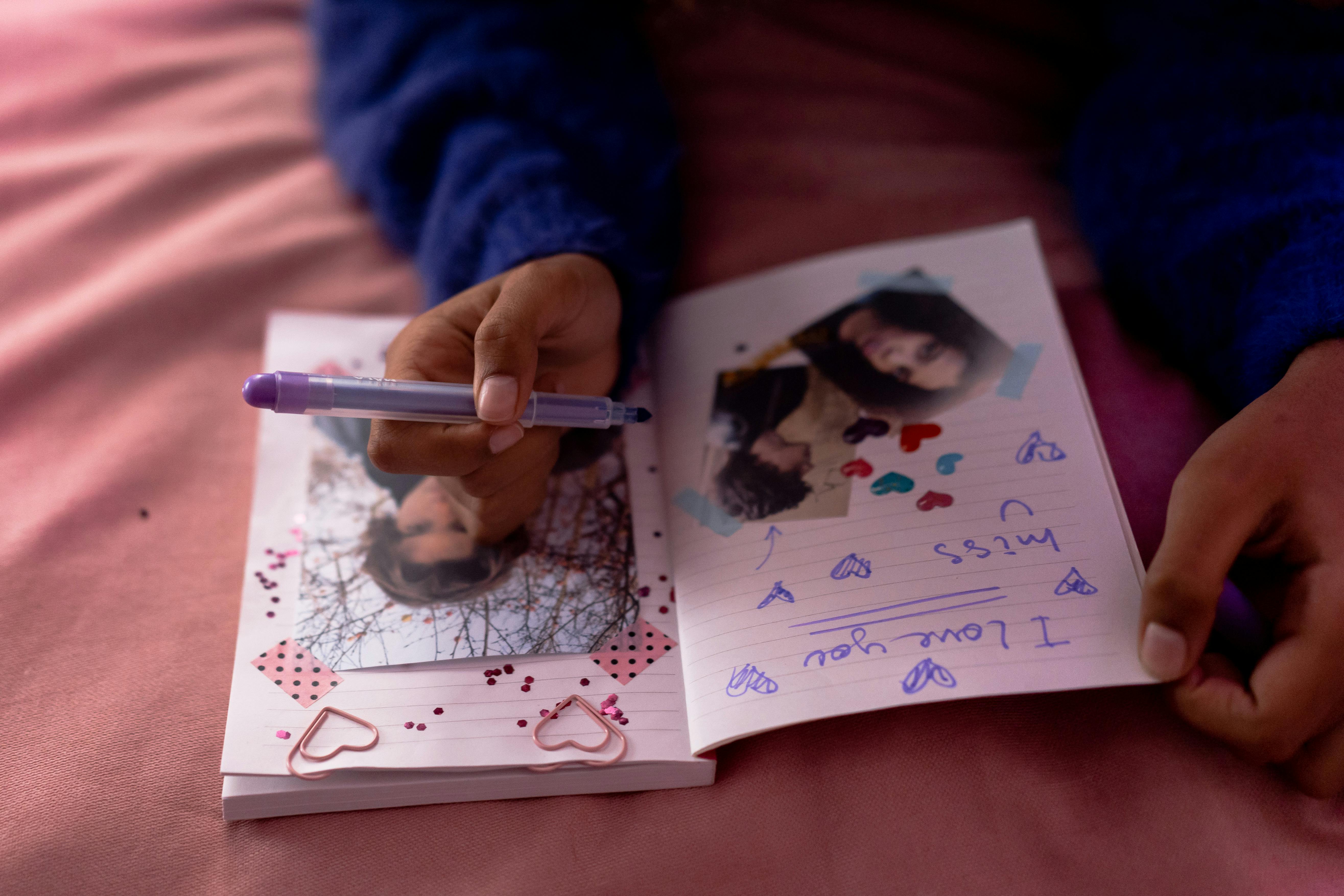 A Person Holding Purple Felt Pen