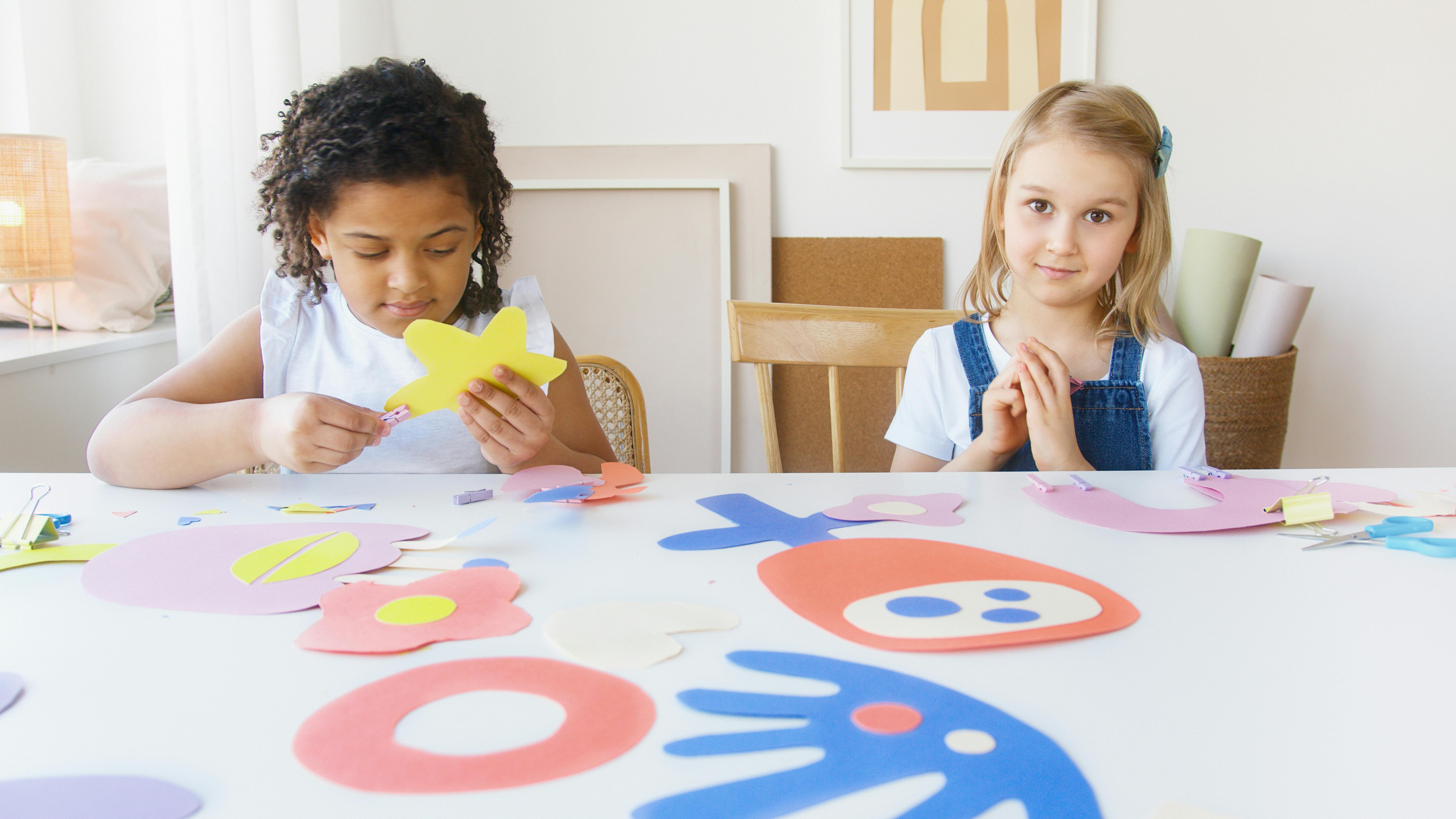 Two Kids Doing Some Artworks