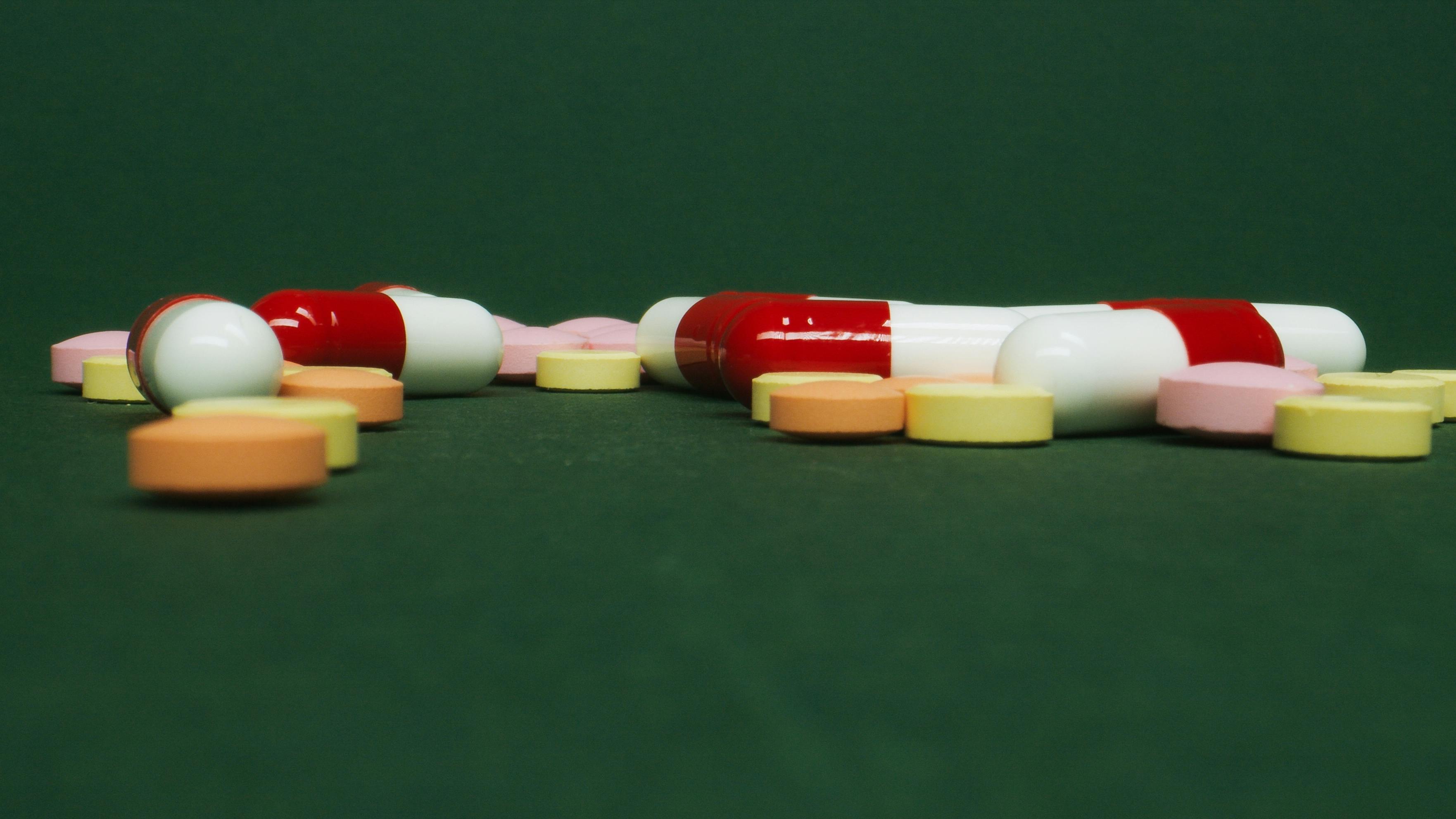 A Group of Capsules and Tablets in Close-up Shot