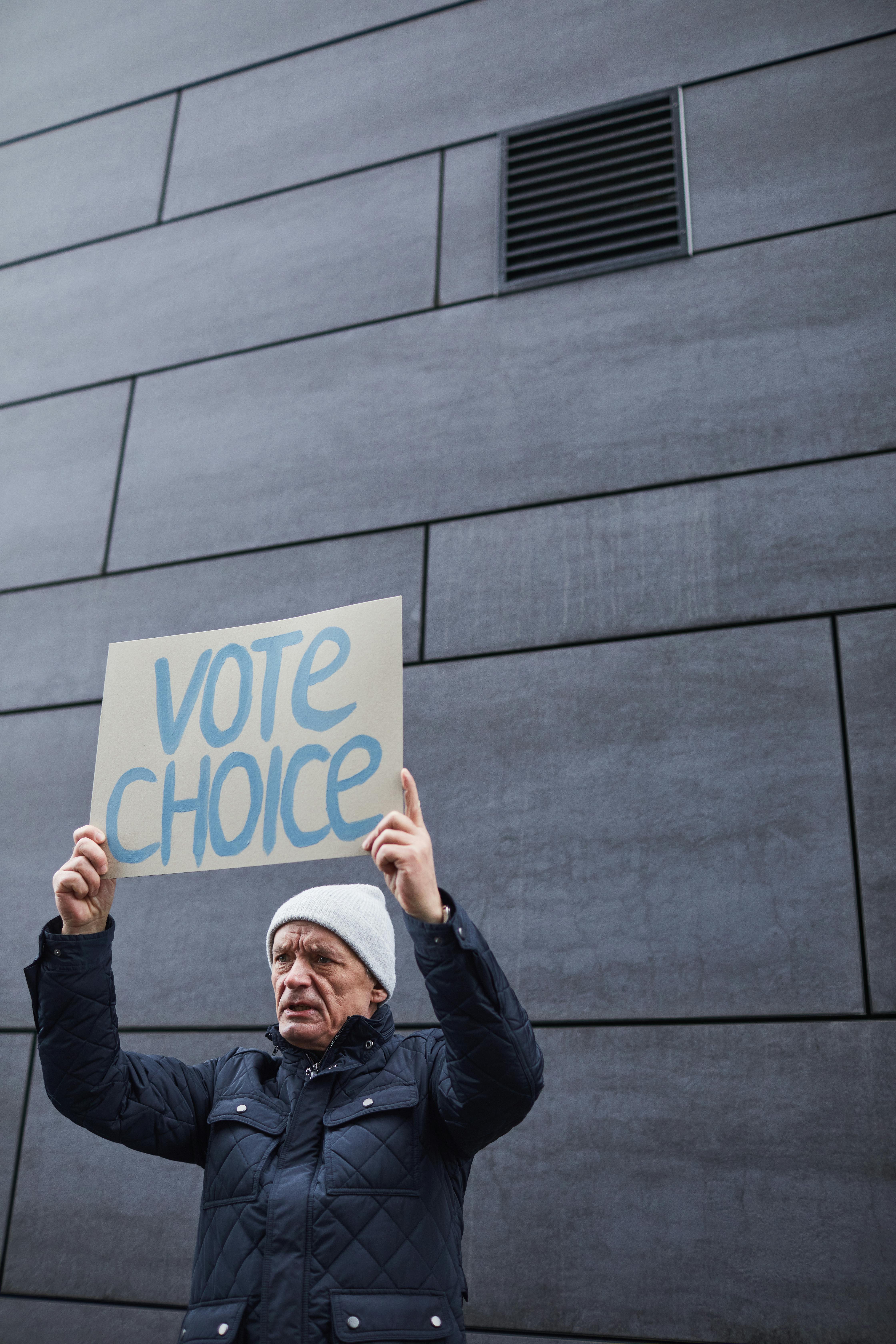 An Elderly Man Doing Protest