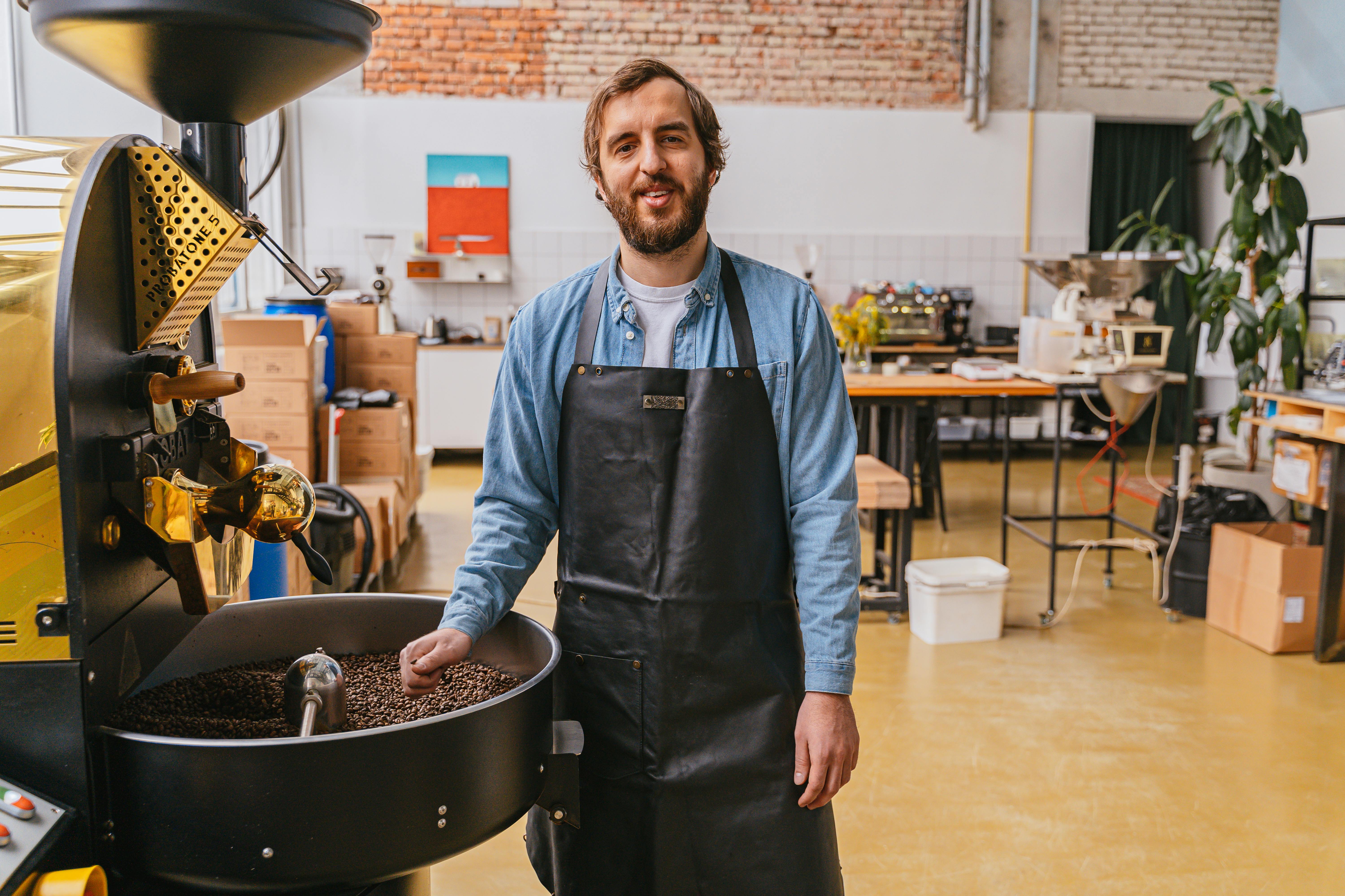 A Man Roasting Coffee Beans