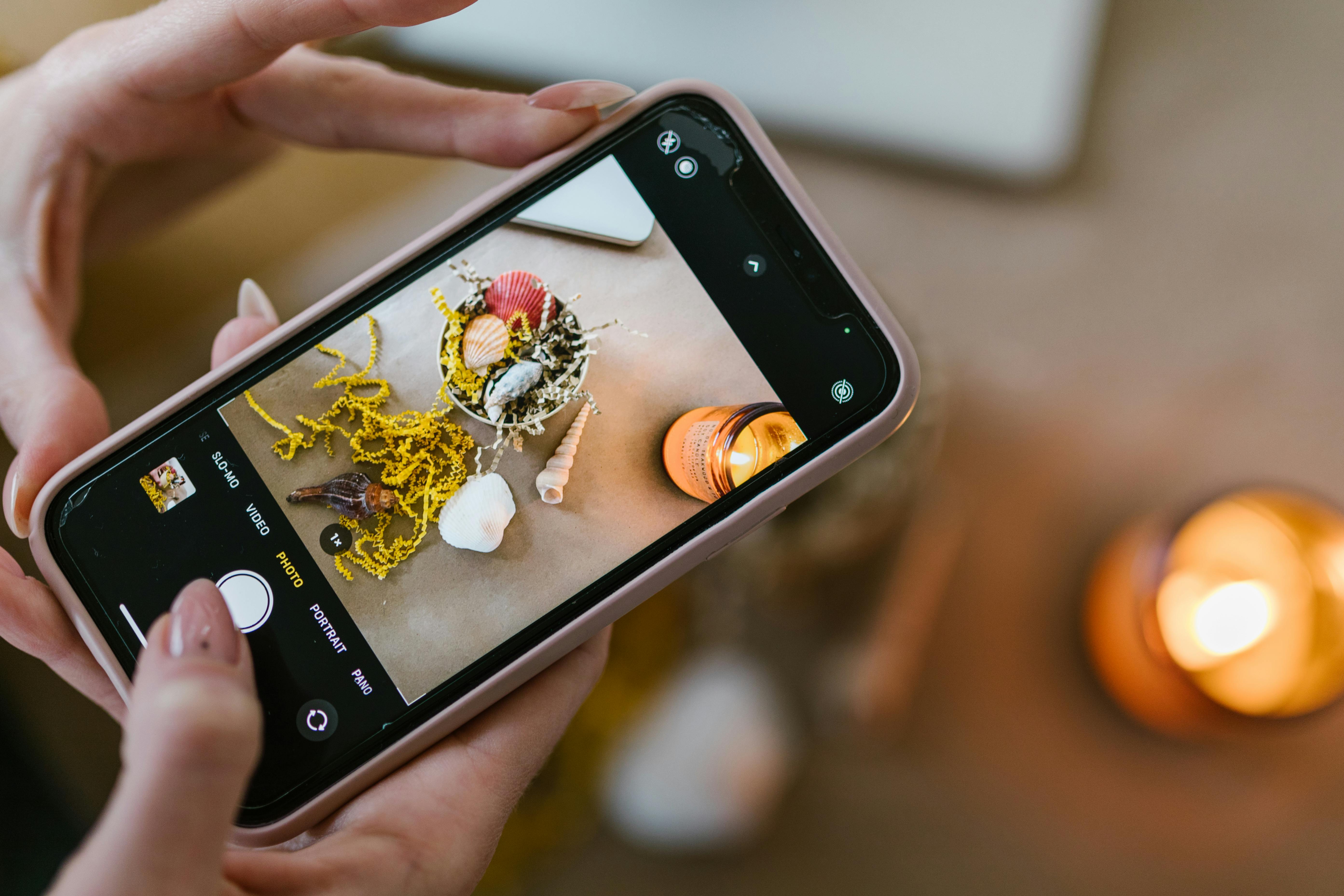 Close-Up Shot of a Person Taking Picture Using a Smartphone