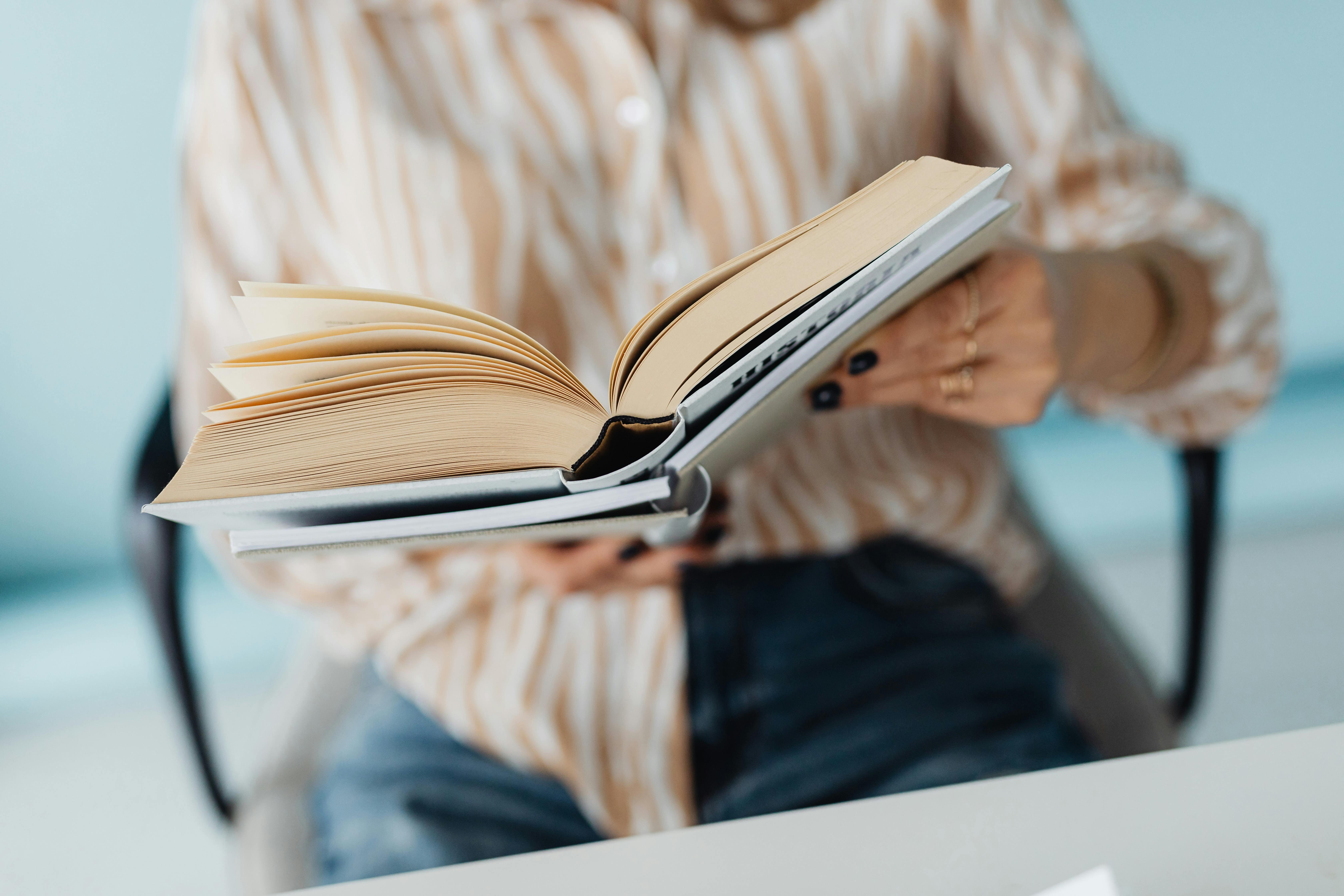 Person Holding a Book