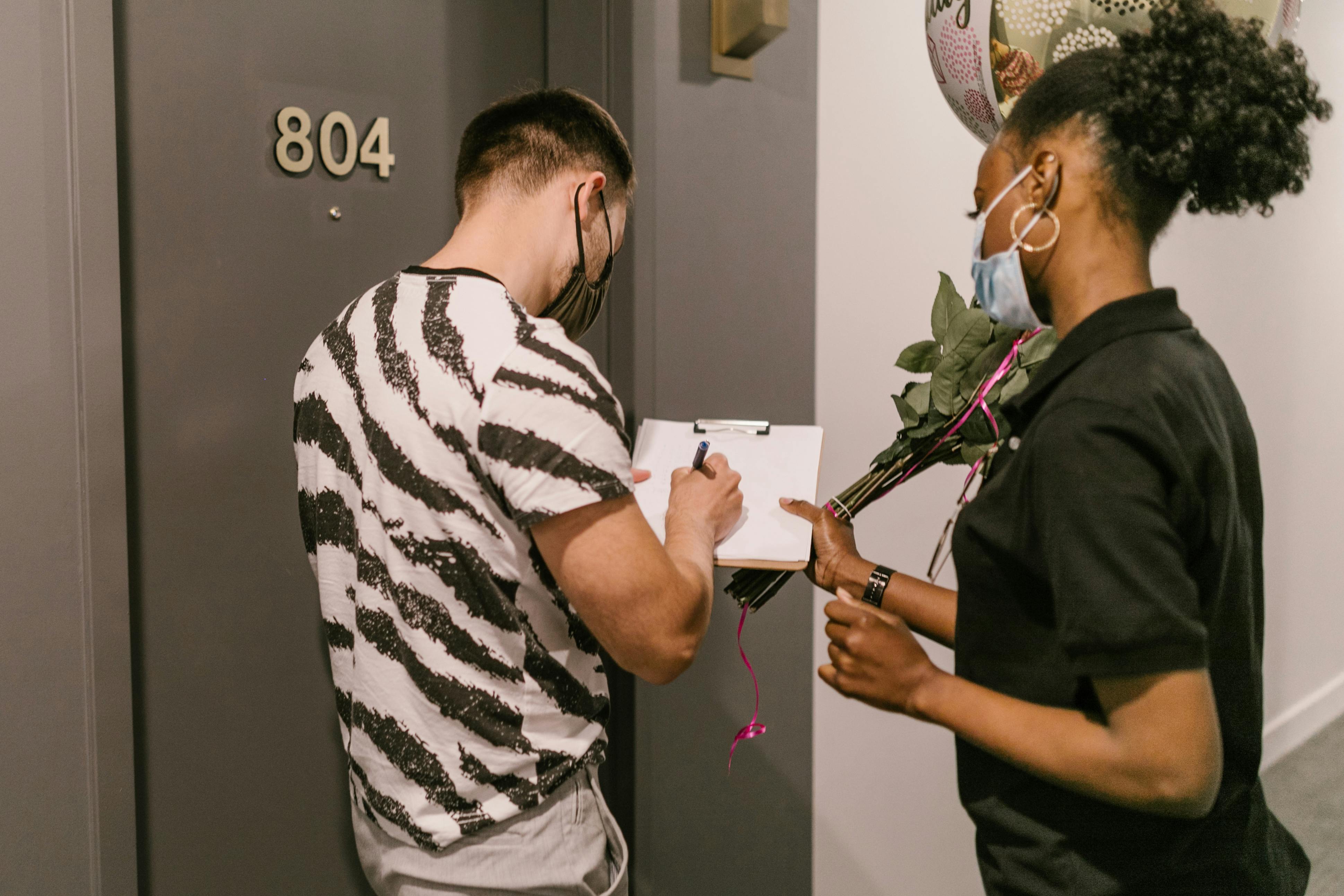A Man Receiving a Flower Delivery