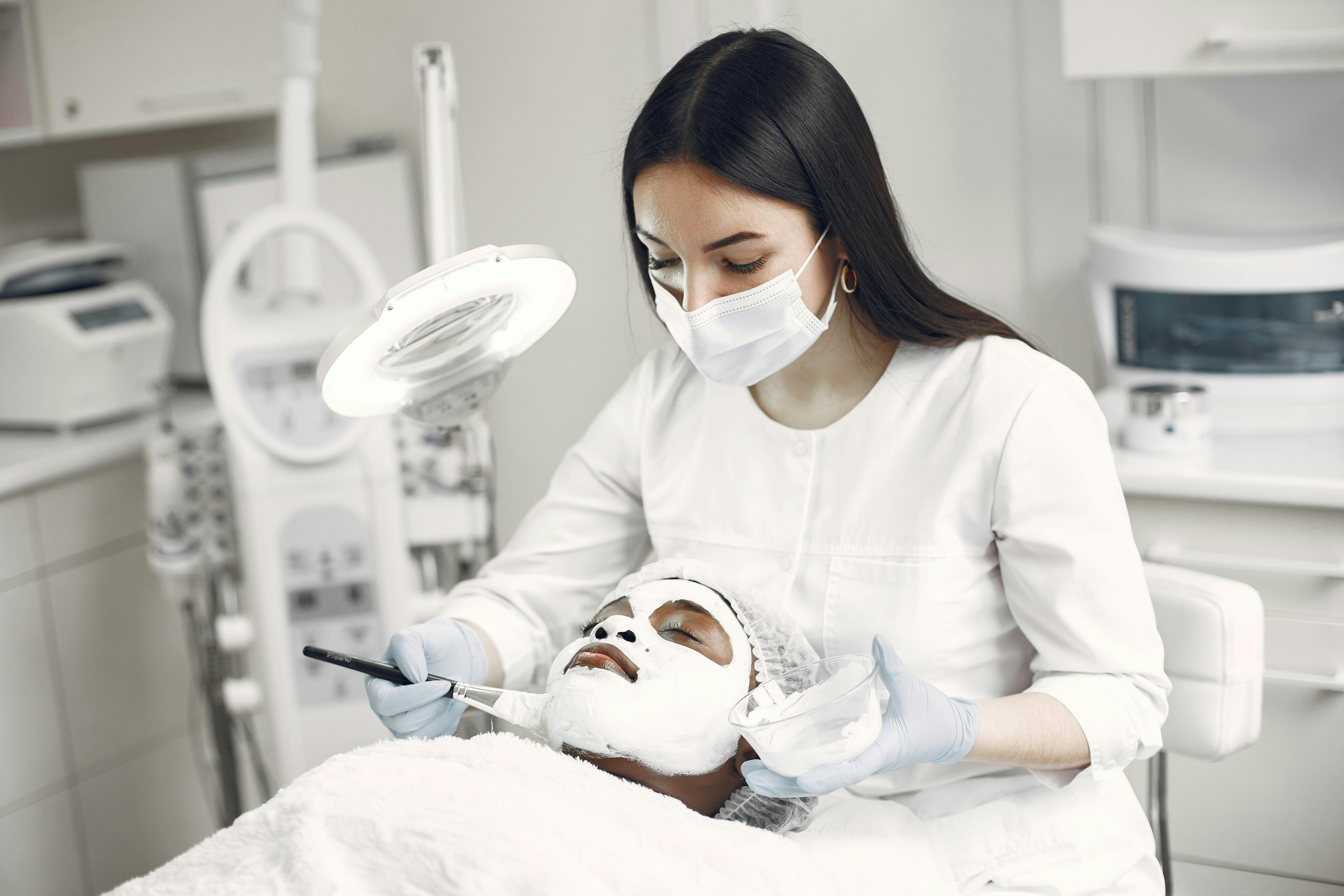 A Woman Getting a Facial Treatment