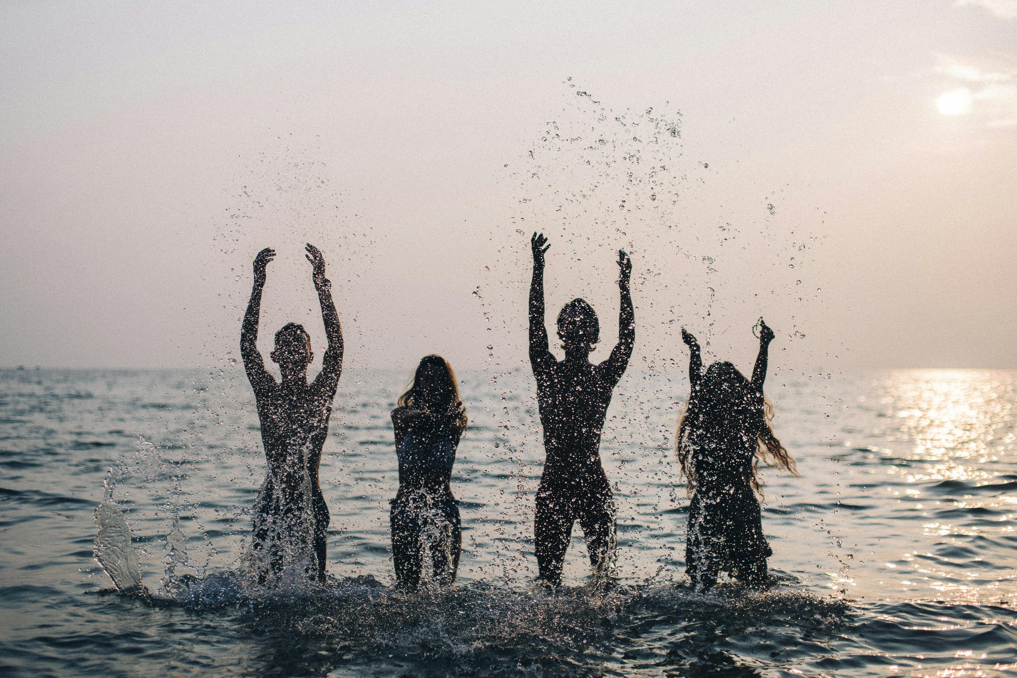 3 Women in Water With Water Droplets