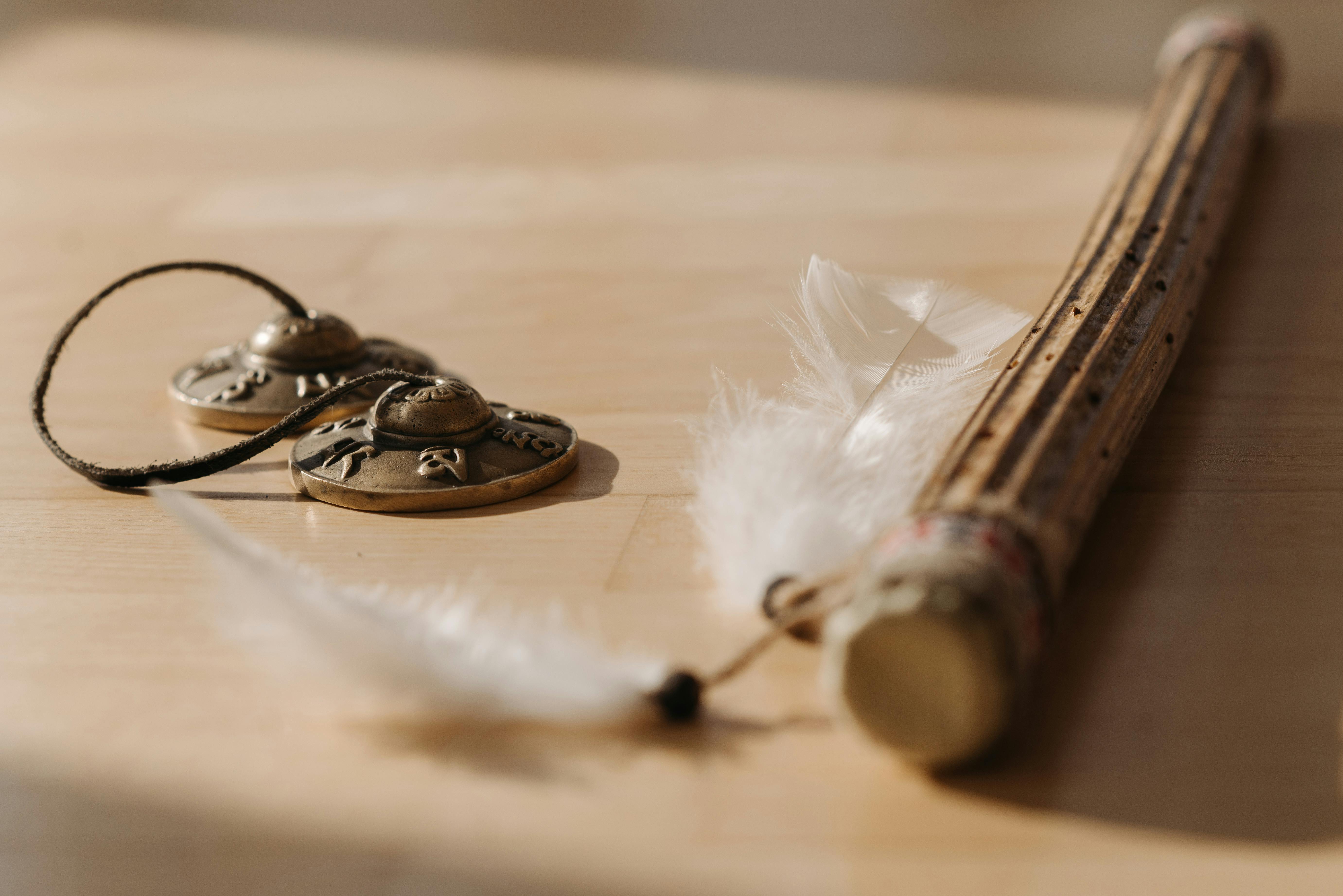 Traditional Instrument and Earring on a Table