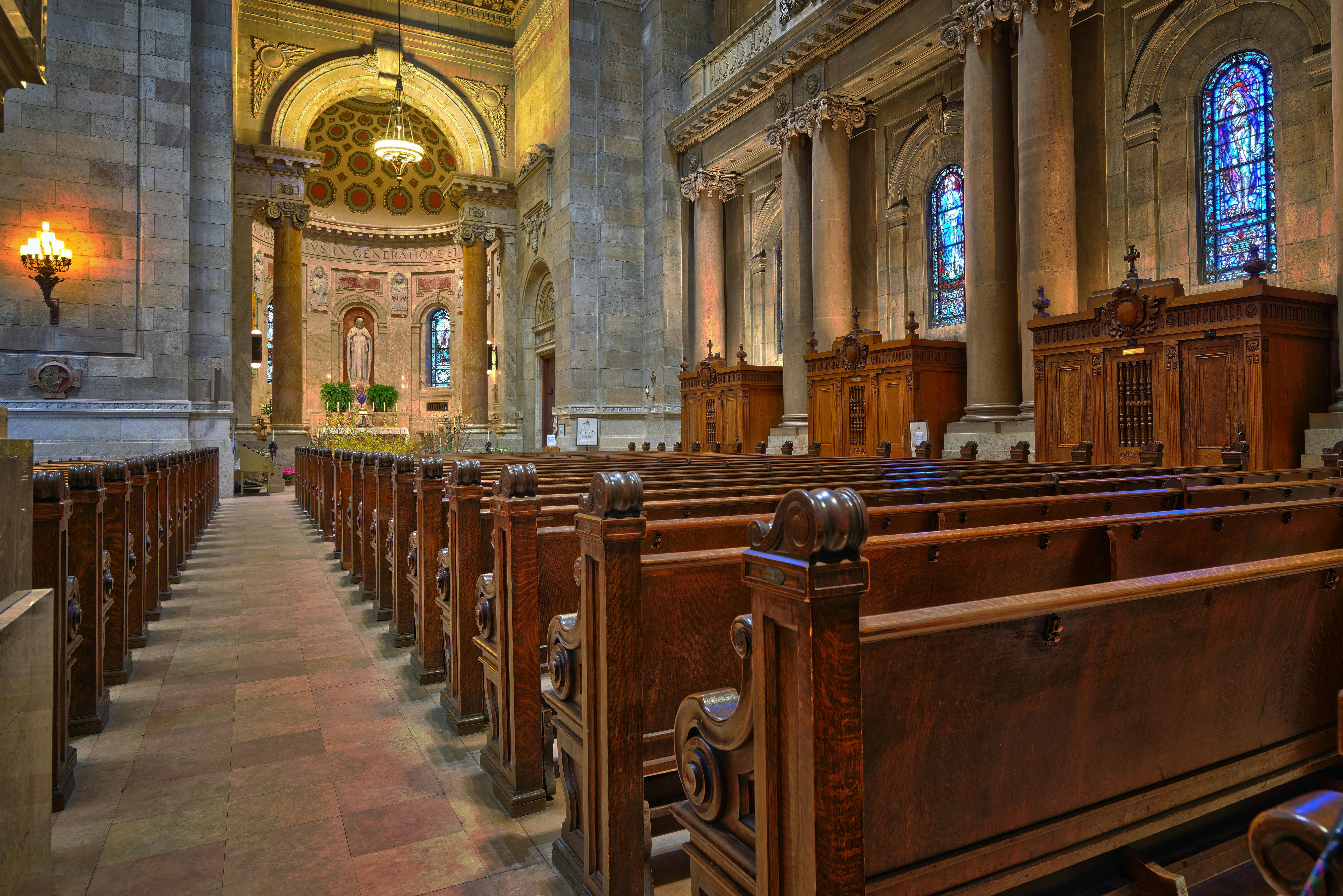 Brown Wooden Church Pew Align Facing the Altar