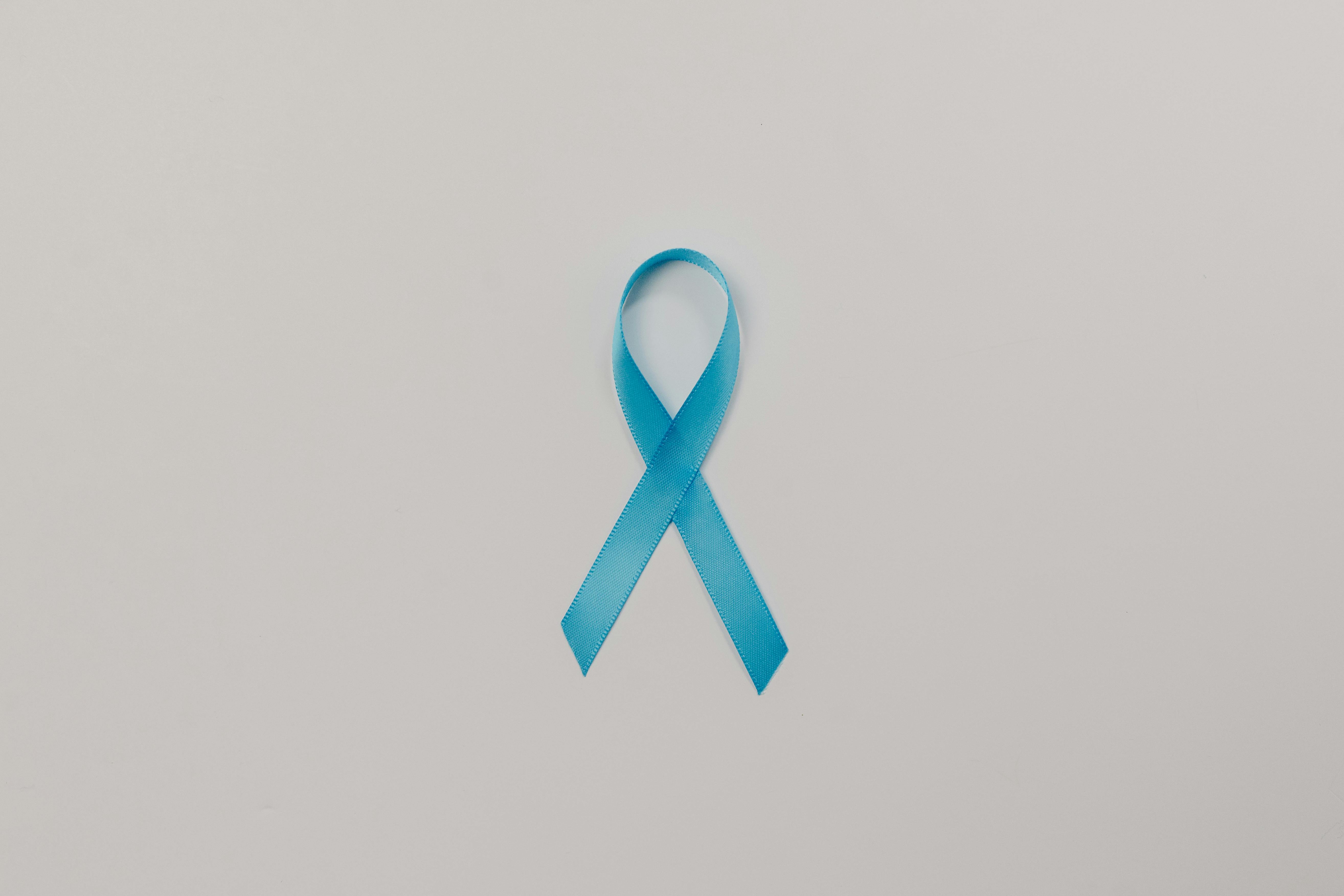 A Blue Satin Ribbon on White Background
