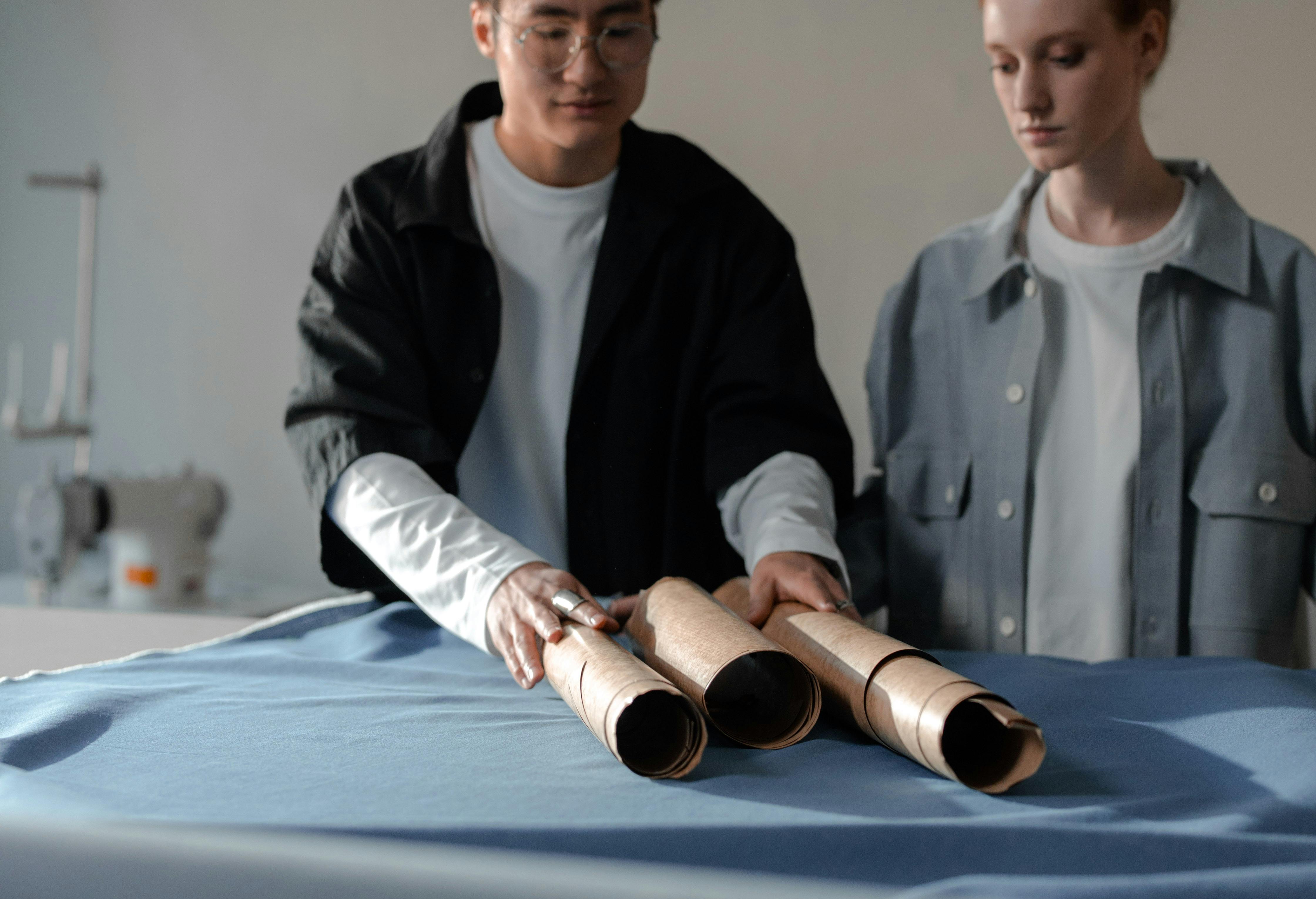 Man and Woman Standing at the Table