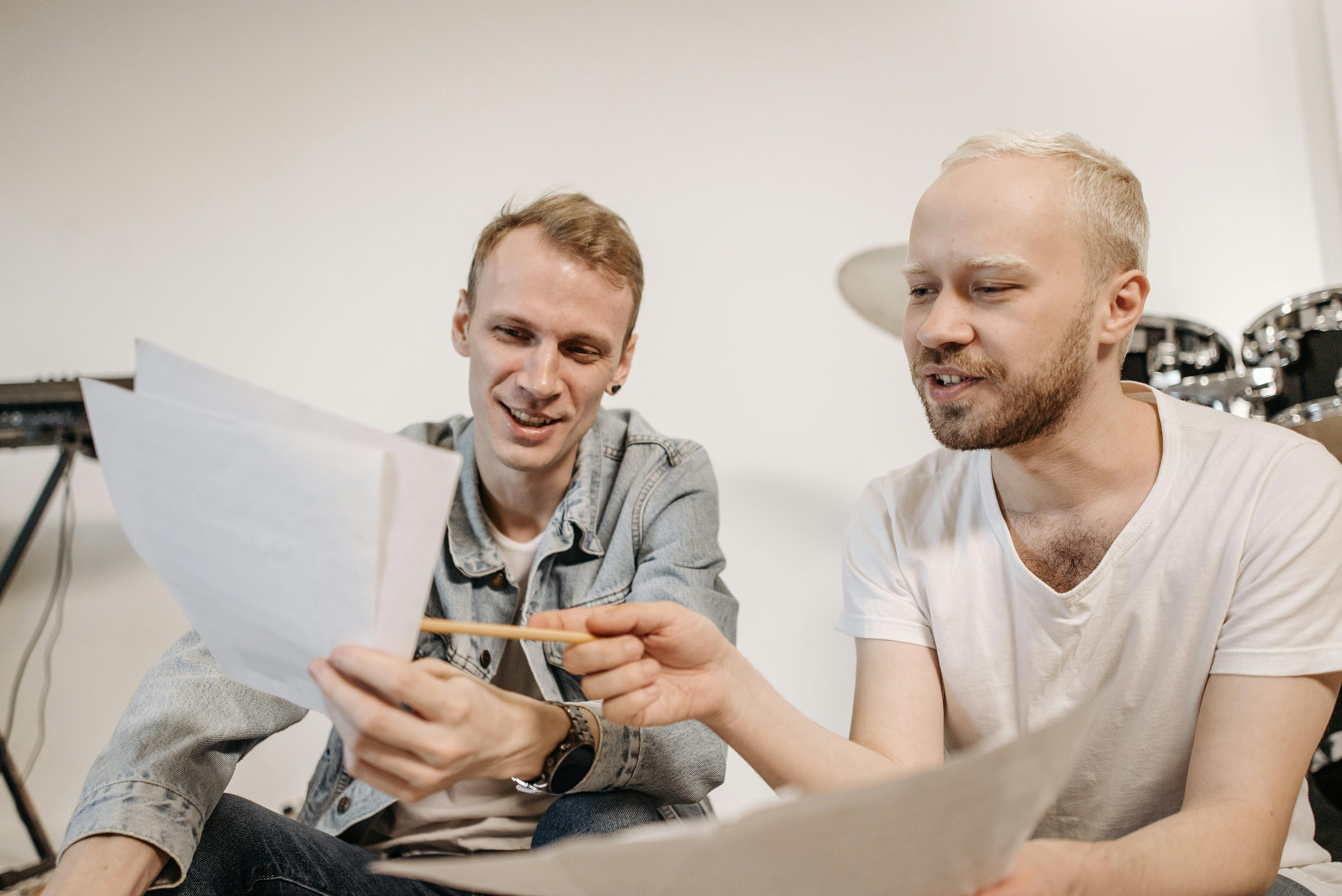 Band Members Looking at Sheet Music
