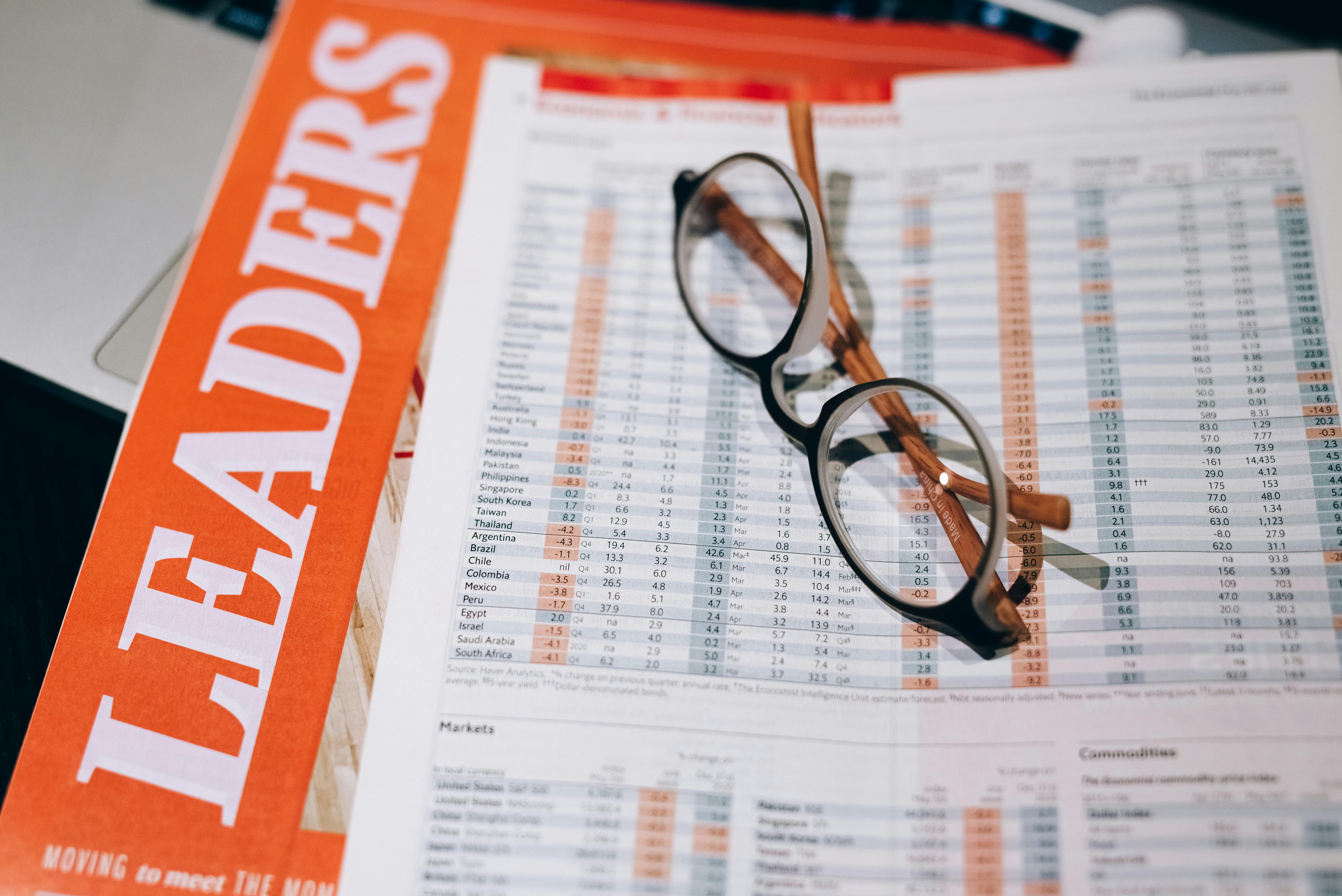 Black Framed Eyeglasses on White Printer paper