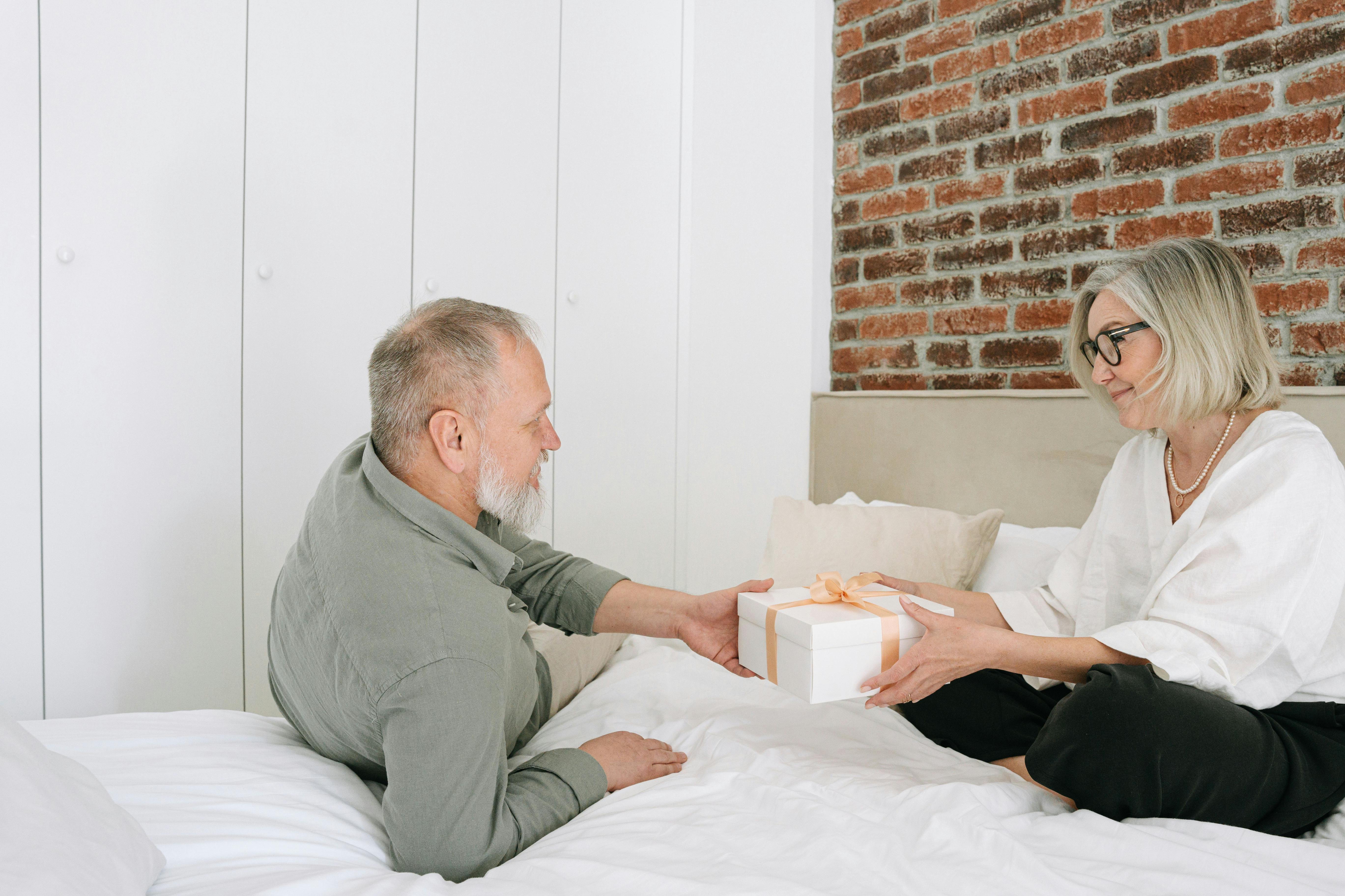 Man Giving Woman a Gift