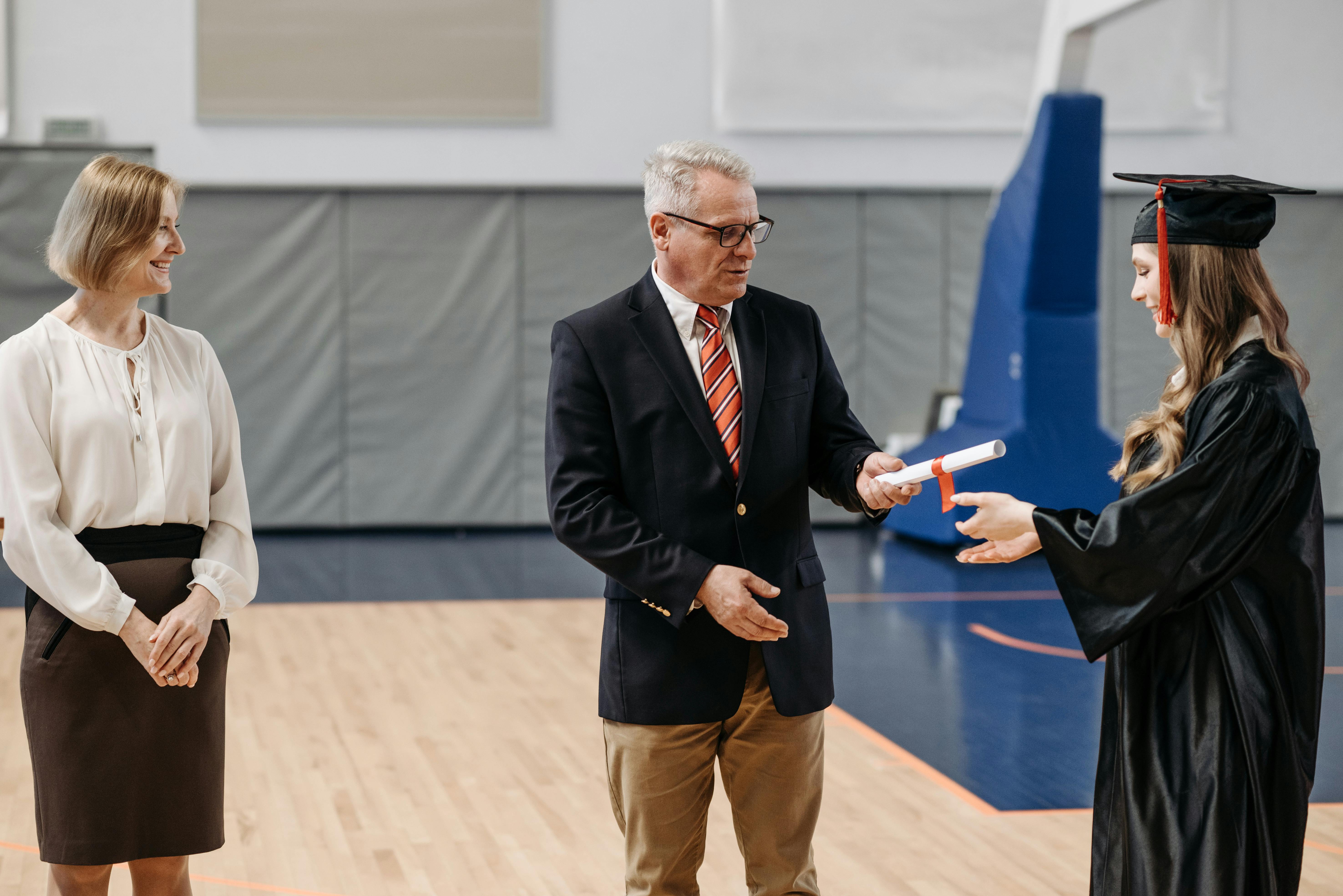 Photo of Woman Receives her Diploma