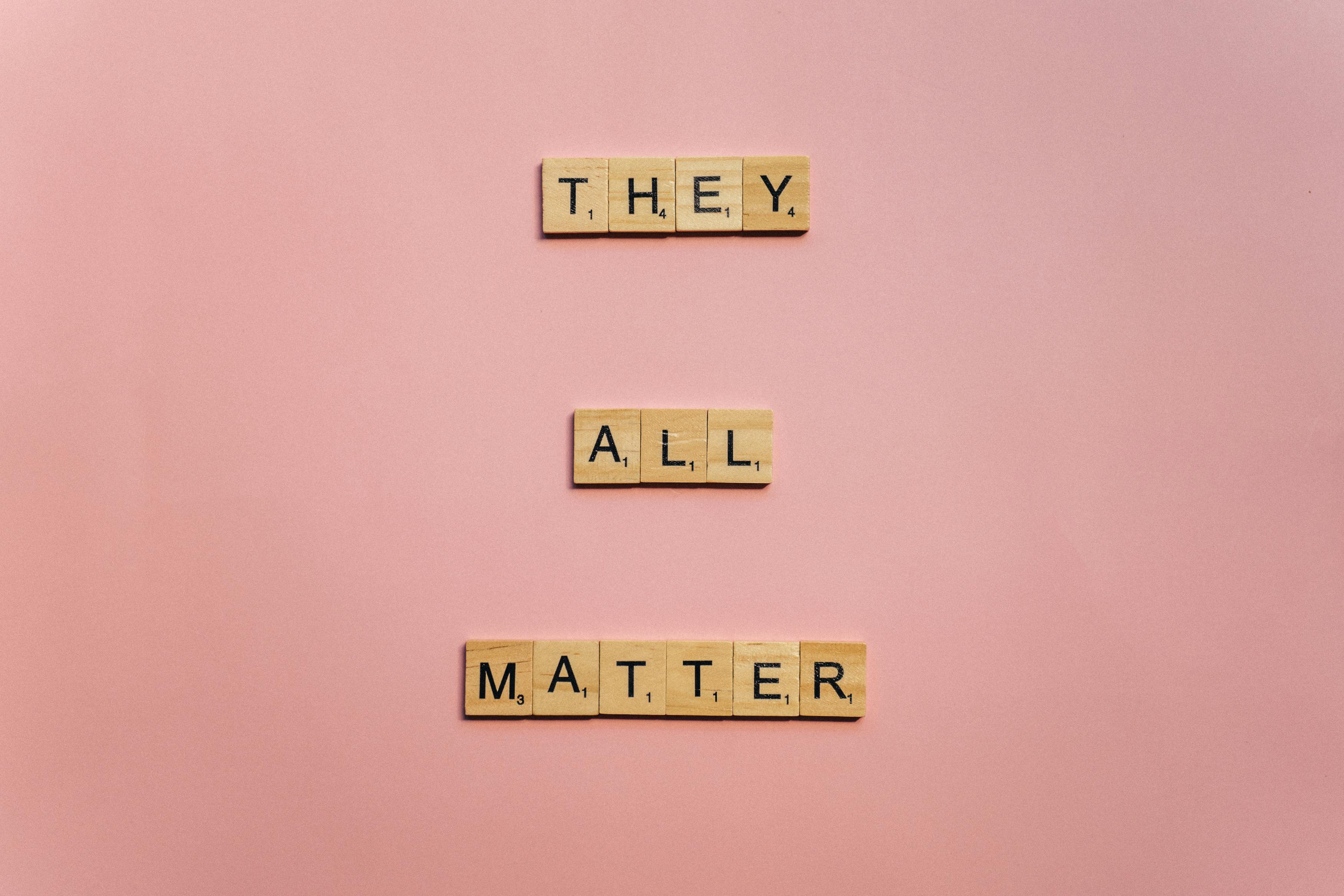 A Slogan They All Matter on Pink Surface