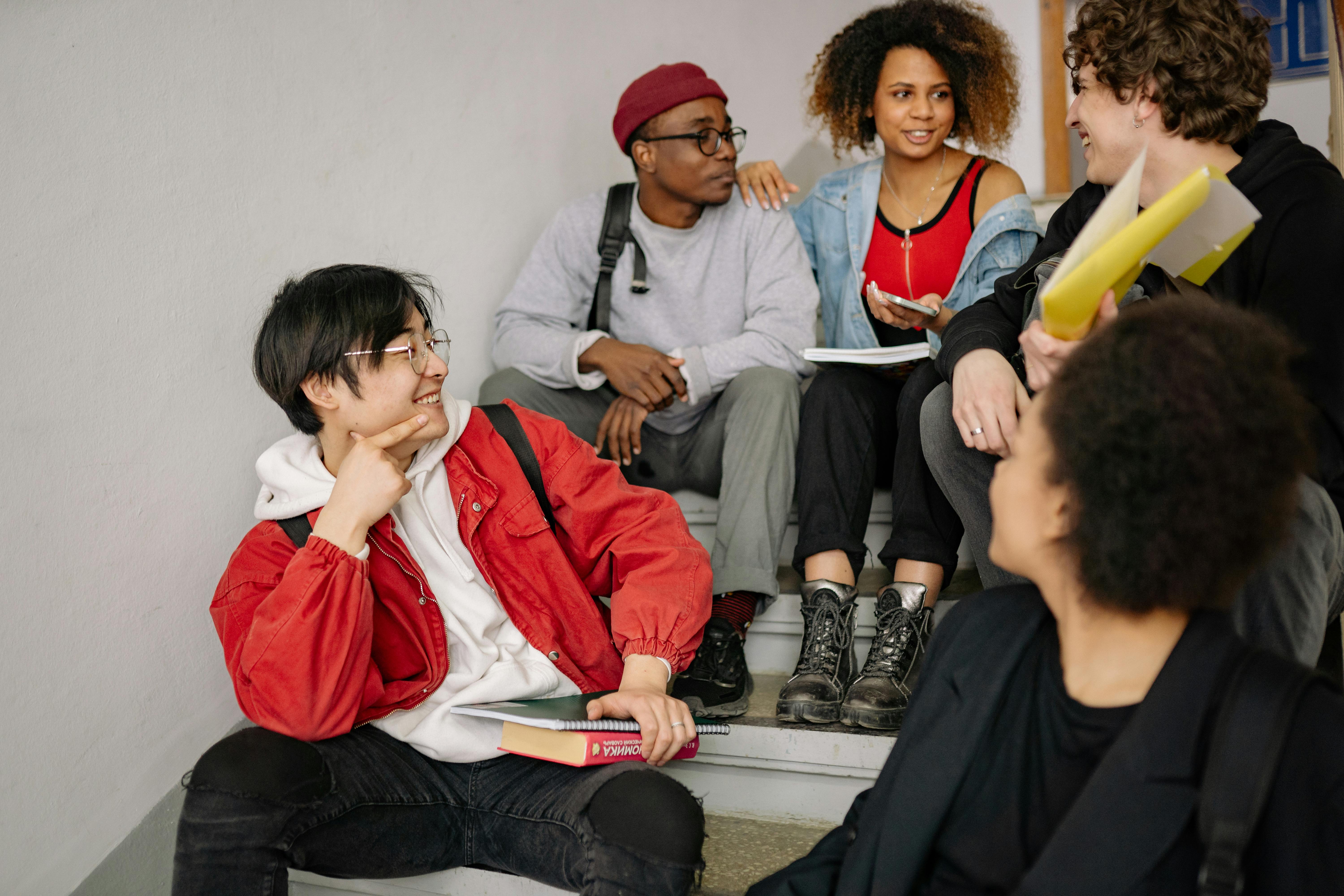 A Group of People Sitting on Stairs